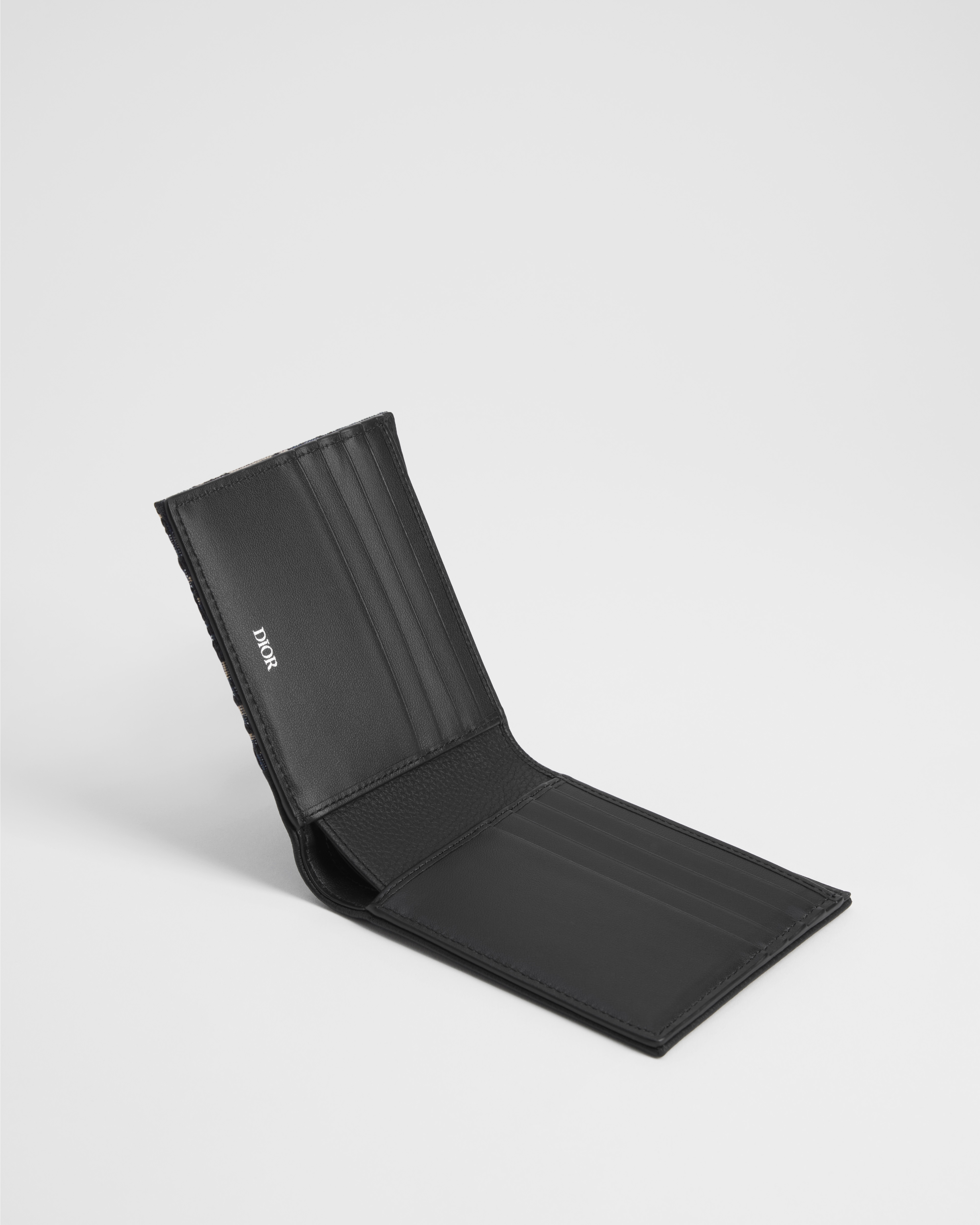 Saddle 兩摺型銀包 黑色顆粒小牛皮鑲嵌工藝配米色和黑色 Dior Oblique 圖案緹花 E07