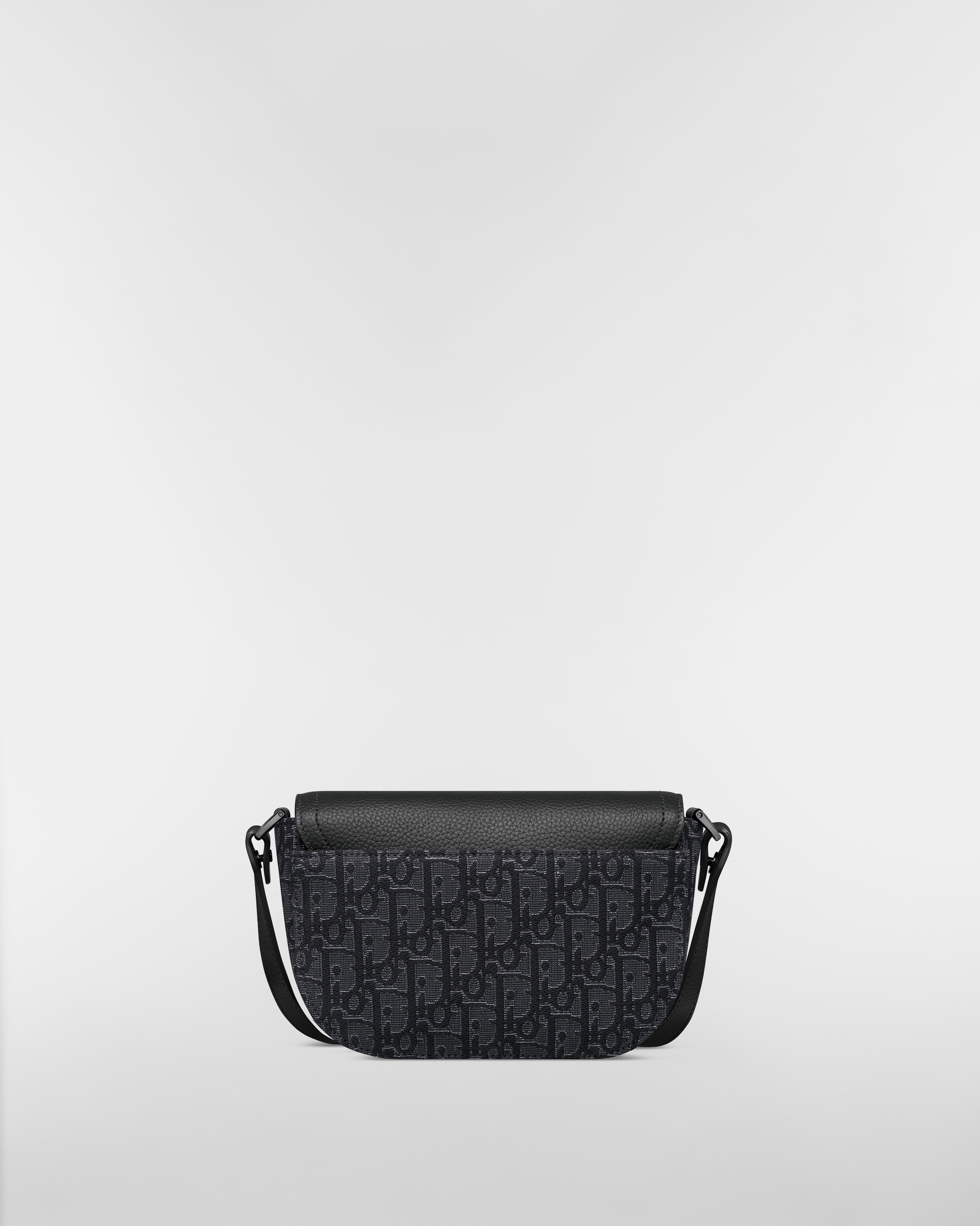 Borsa messenger mini Saddle con pattina Jacquard nero con motivo Dior Oblique metallizzato color argento e pelle di vitello granulata nera E08