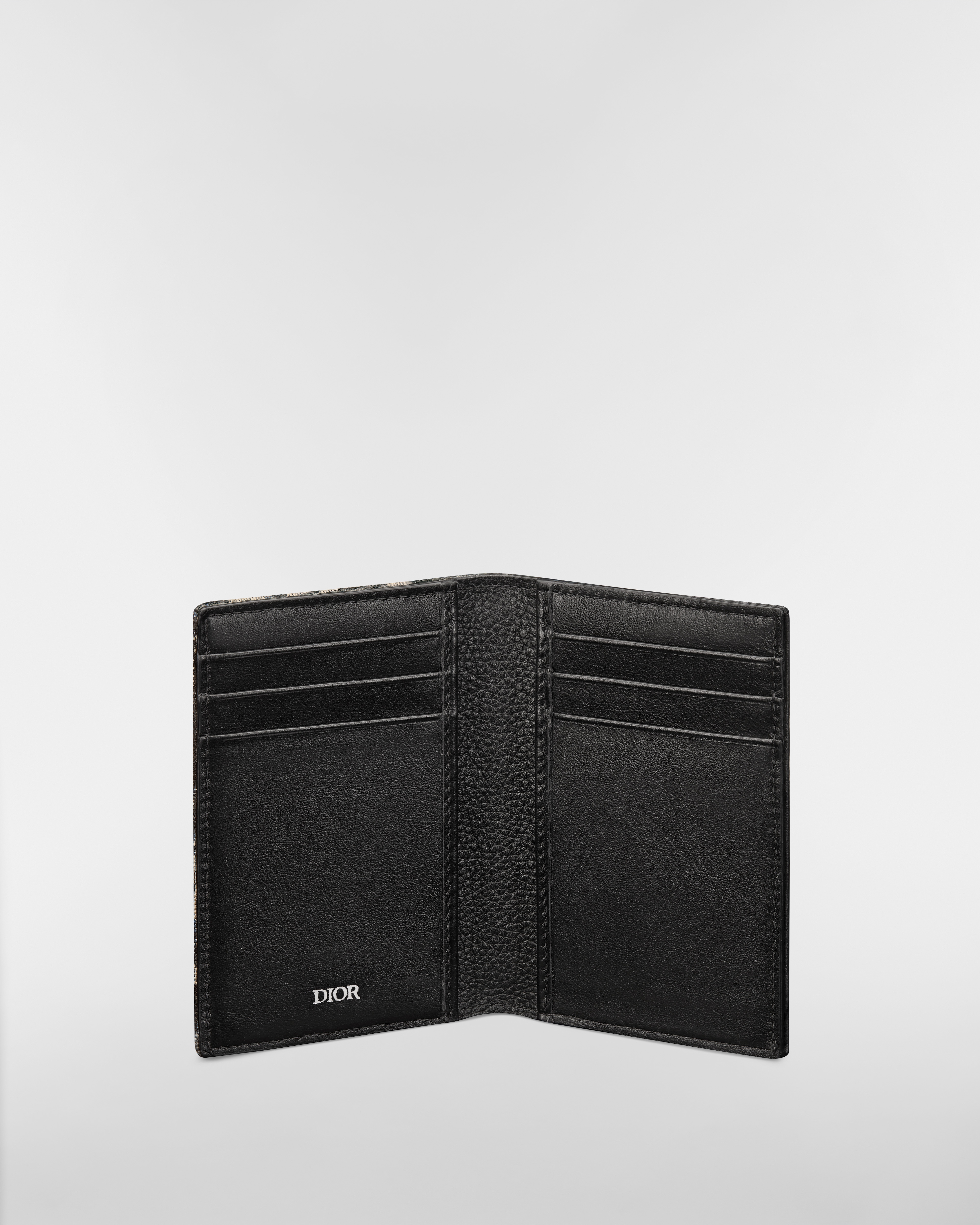 Saddle 直式兩摺型卡片套 黑色顆粒小牛皮鑲嵌工藝配米色和黑色 Dior Oblique 圖案緹花 E07