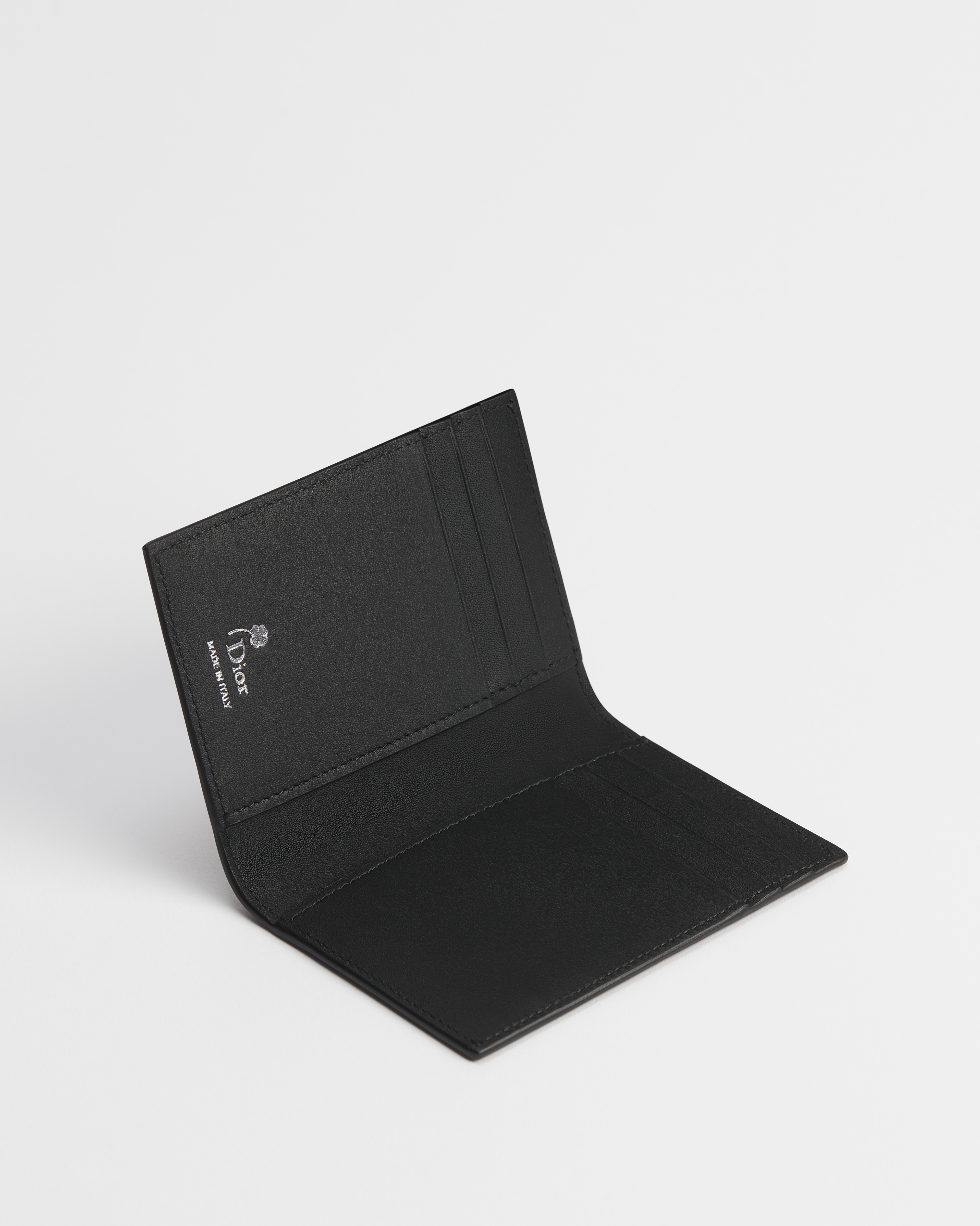 Bifold-Kartenetui Book-Cover-Prägung auf Kalbsleder in Schwarz und Weiß E07