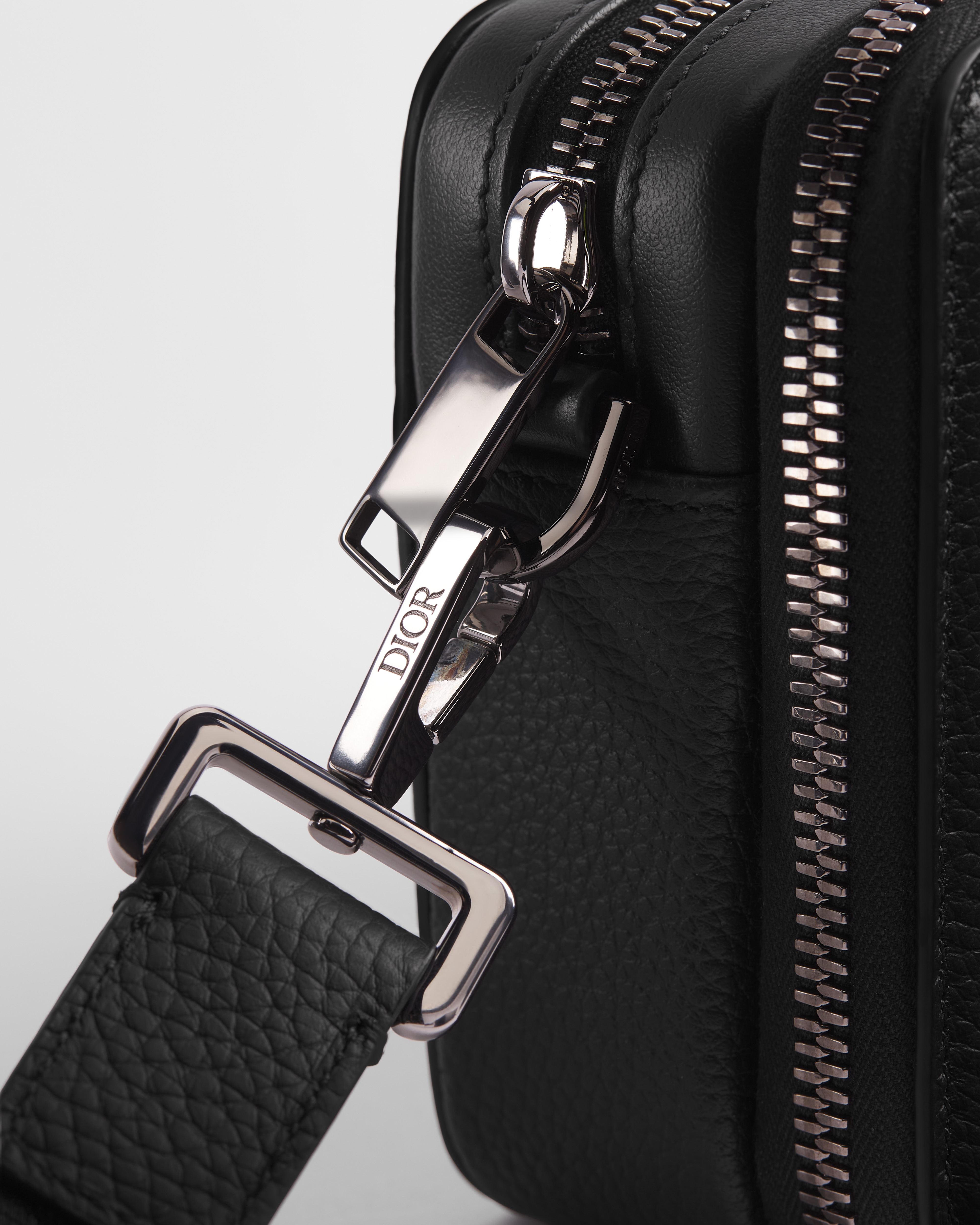 CD Icon Zipped Pouch with Strap Black Grained Calfskin E09