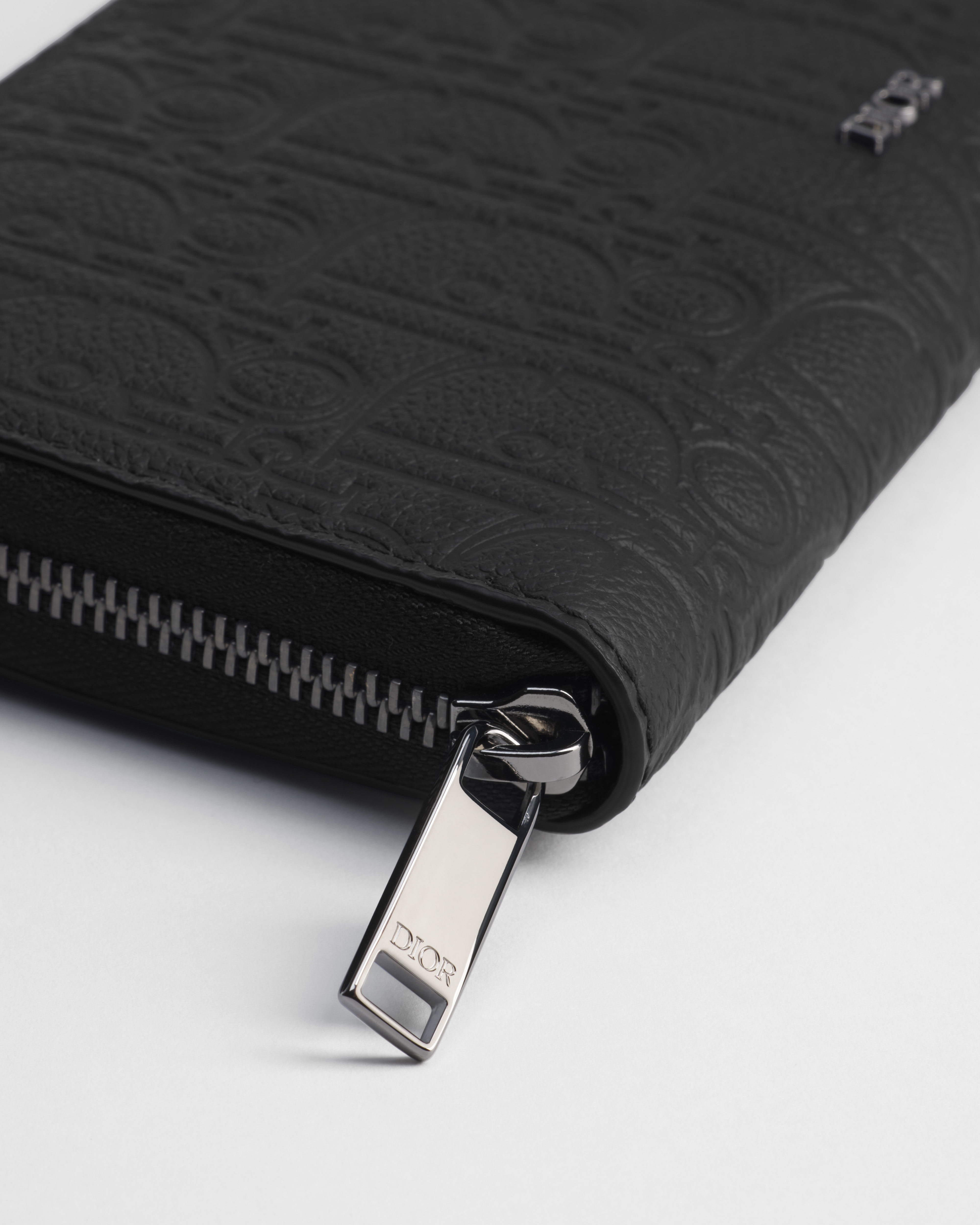 Langes Portemonnaie mit Reißverschluss Dior Gravity Leder in Schwarz E10