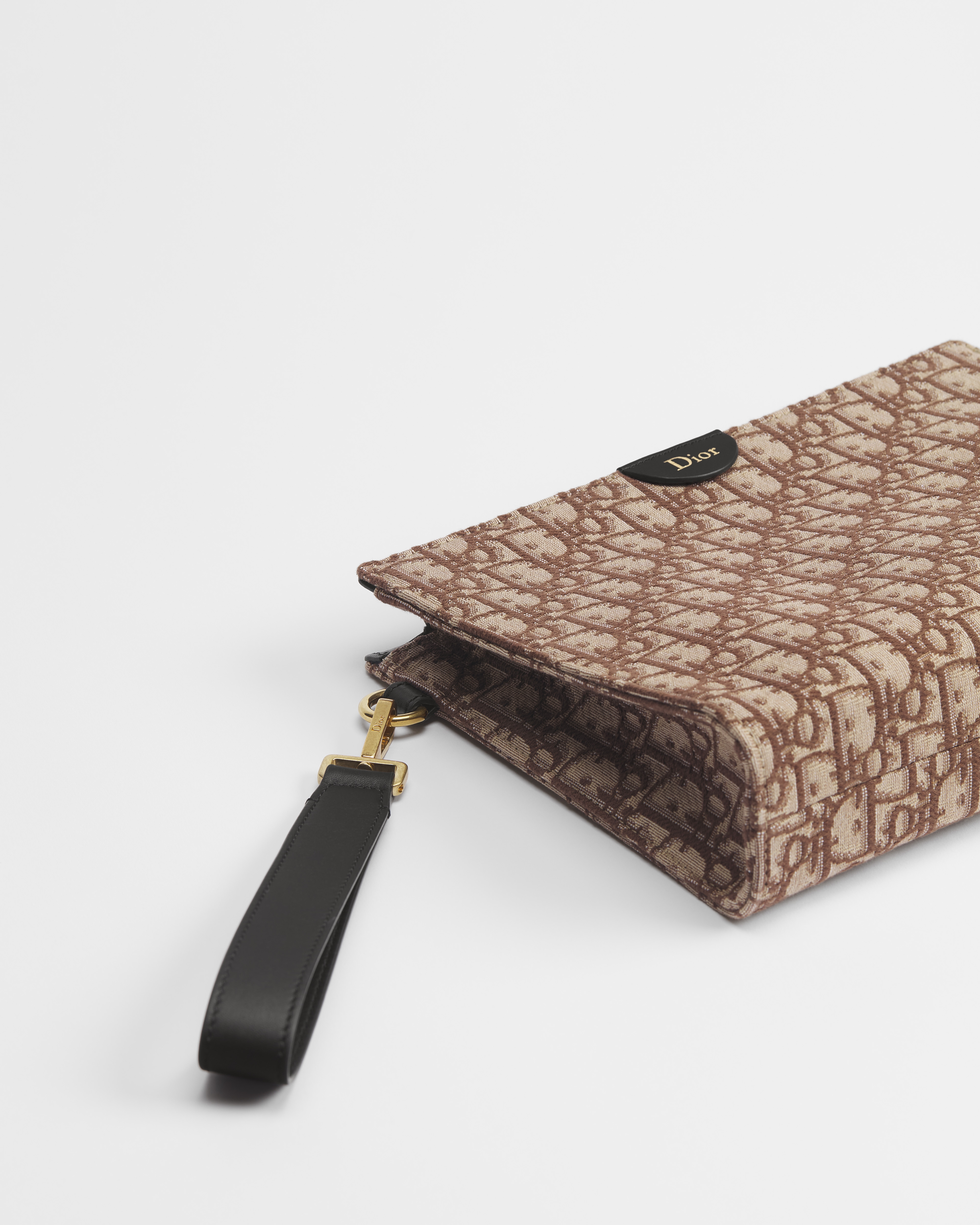 Pochette triangular A5 Dior Oblique en jacquard marrón E10