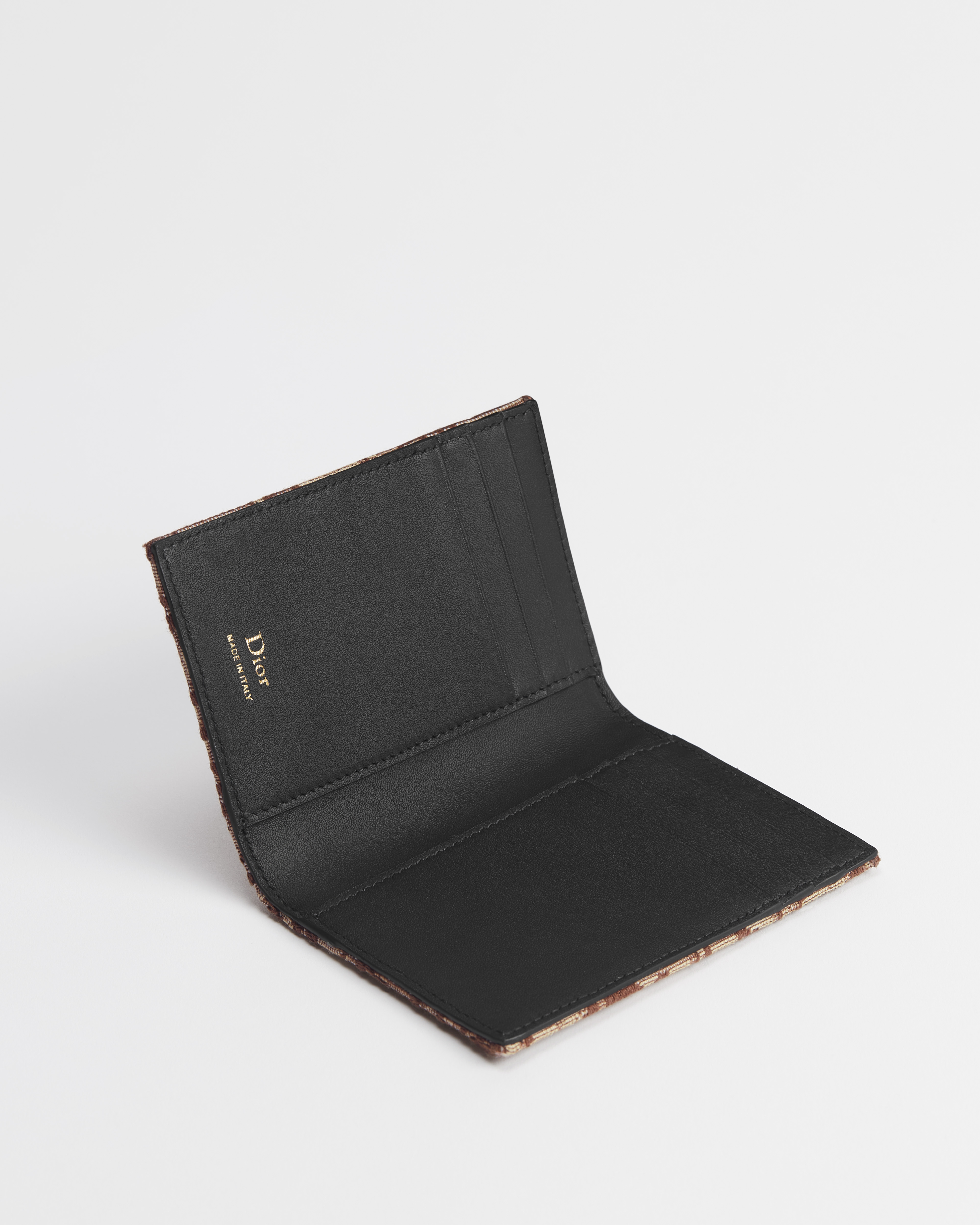 حاملة بطاقات ثنائية الطيّ نمط ديور أوبليك البني بحبك الجاكار E07