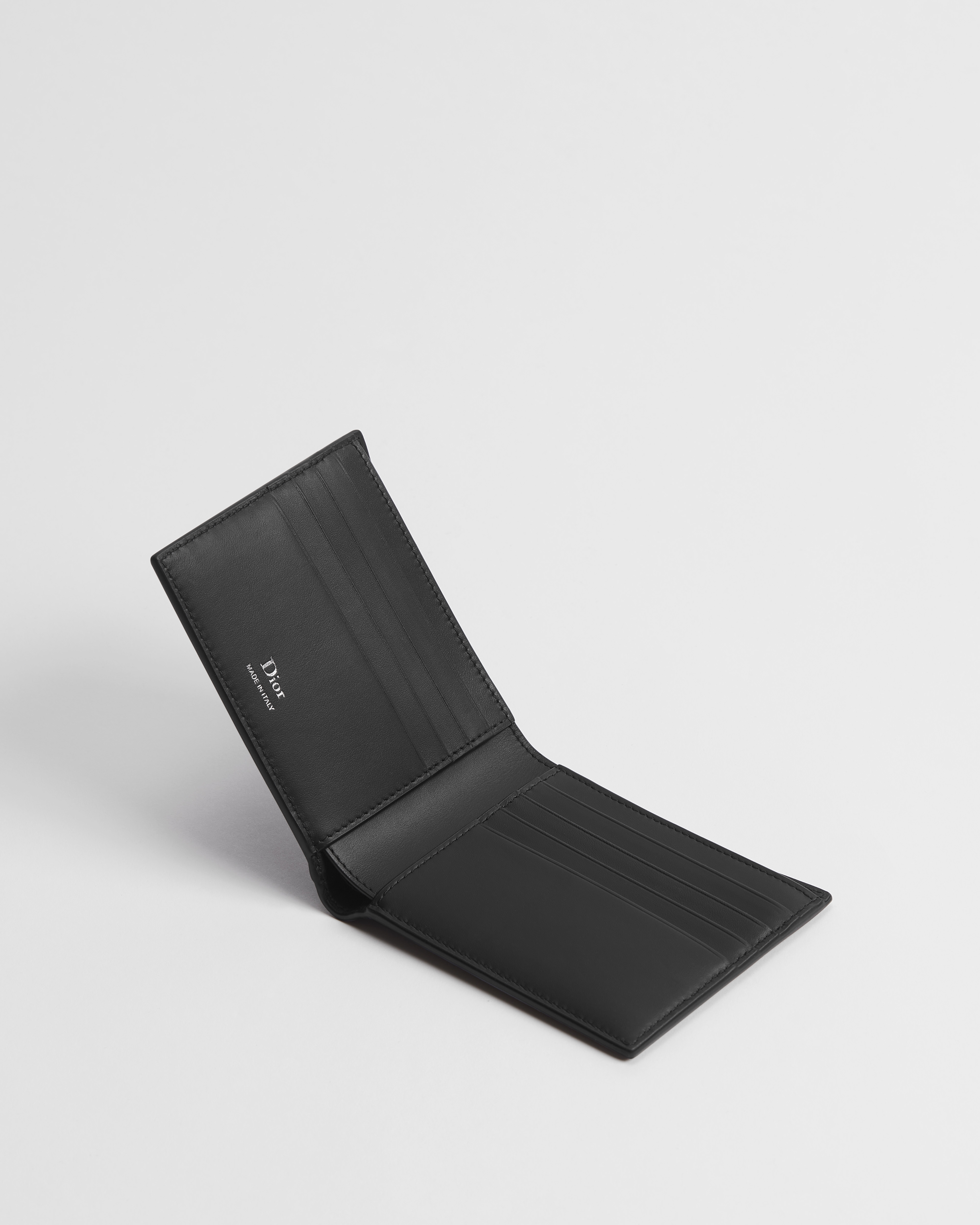Dior Archie Bifold-Portemonnaie Genarbtes Kalbsleder in Schwarz E07