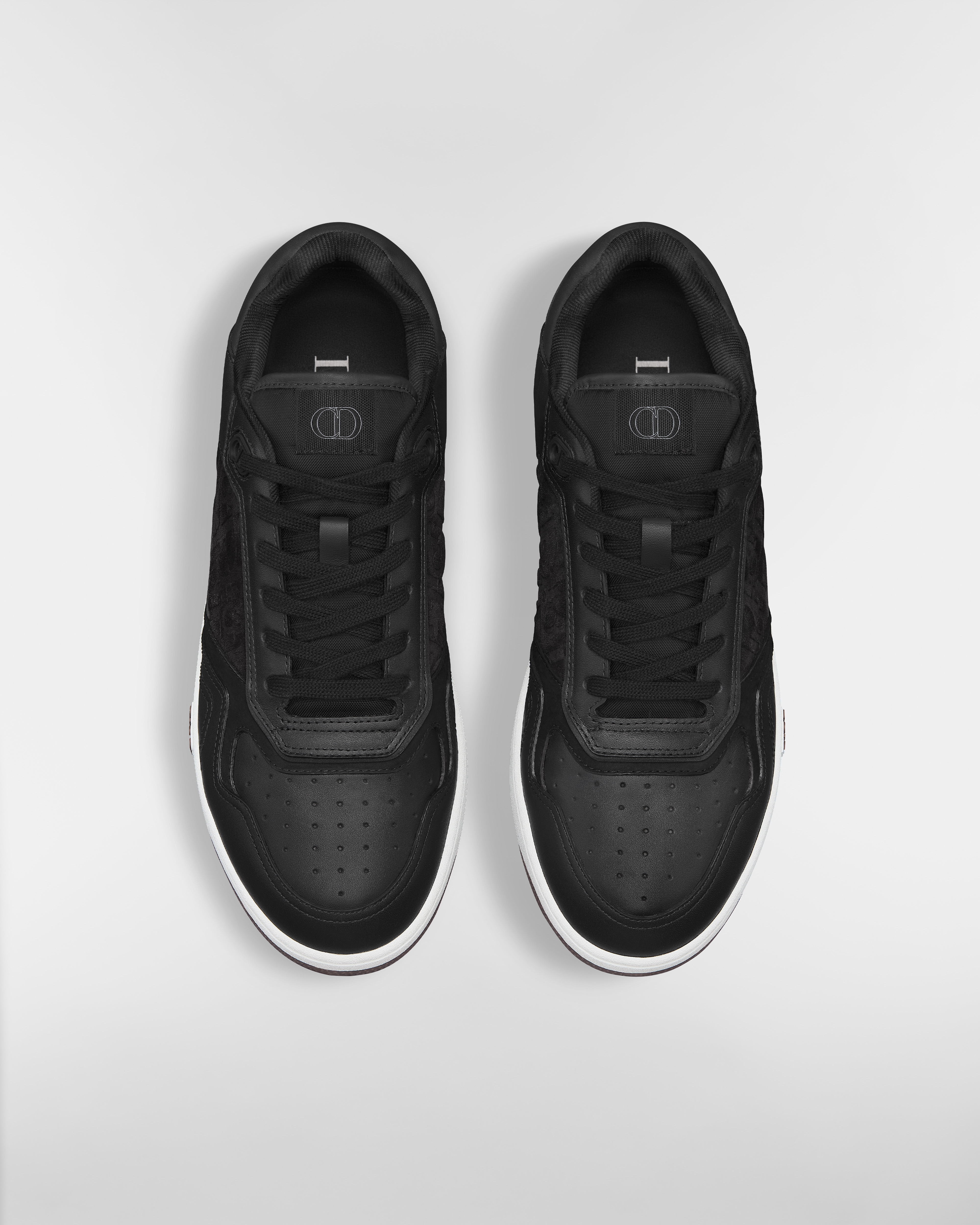 B27 Uptown Low Top Sneaker Glattes Kalbsleder in Schwarz und Veloursleder mit Dior Oblique Prägung in Schwarz E06