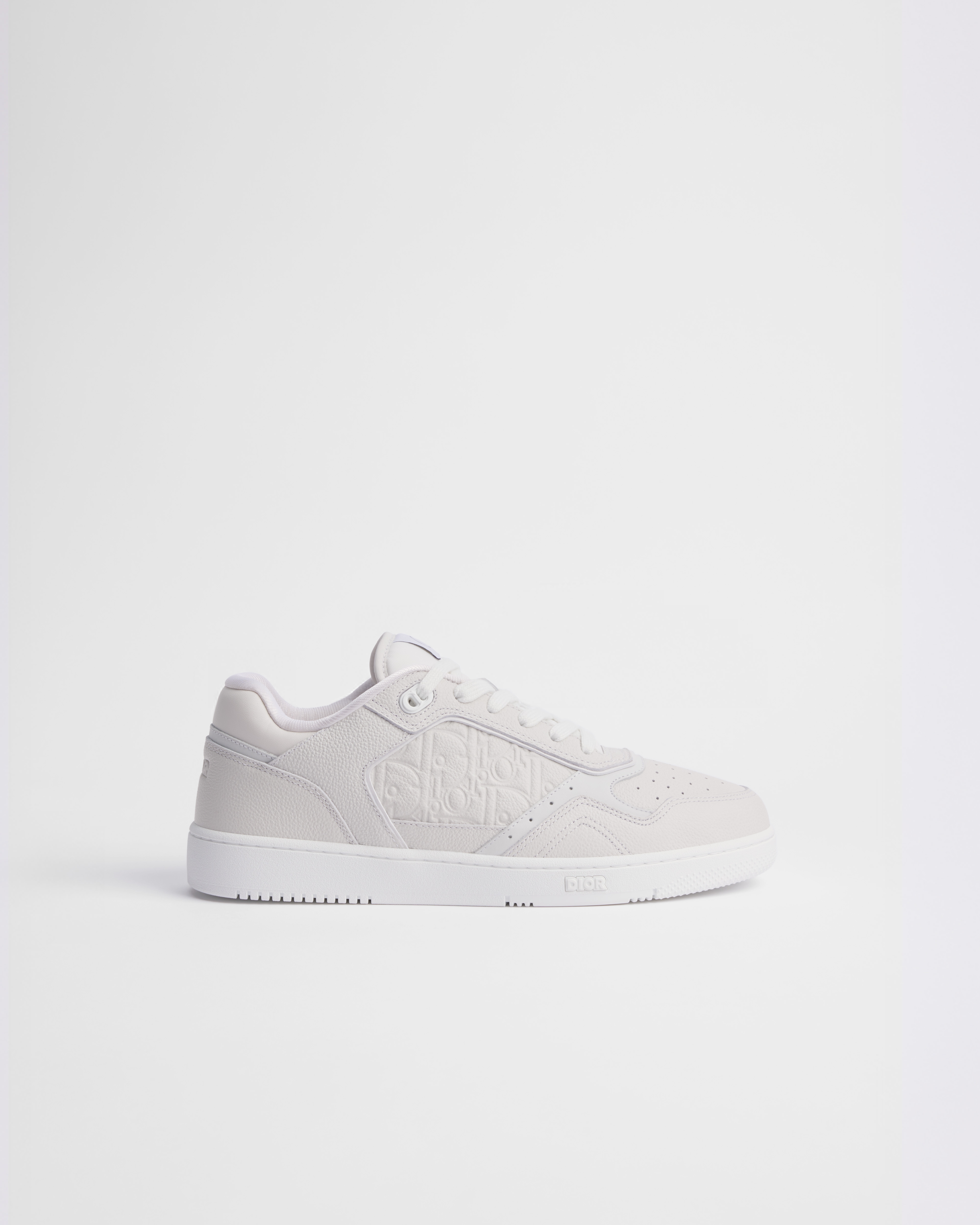 B27 Uptown Low Top Sneaker Genarbtes Kalbsleder in Weiß und Dior Gravity Leder in Weiß E02