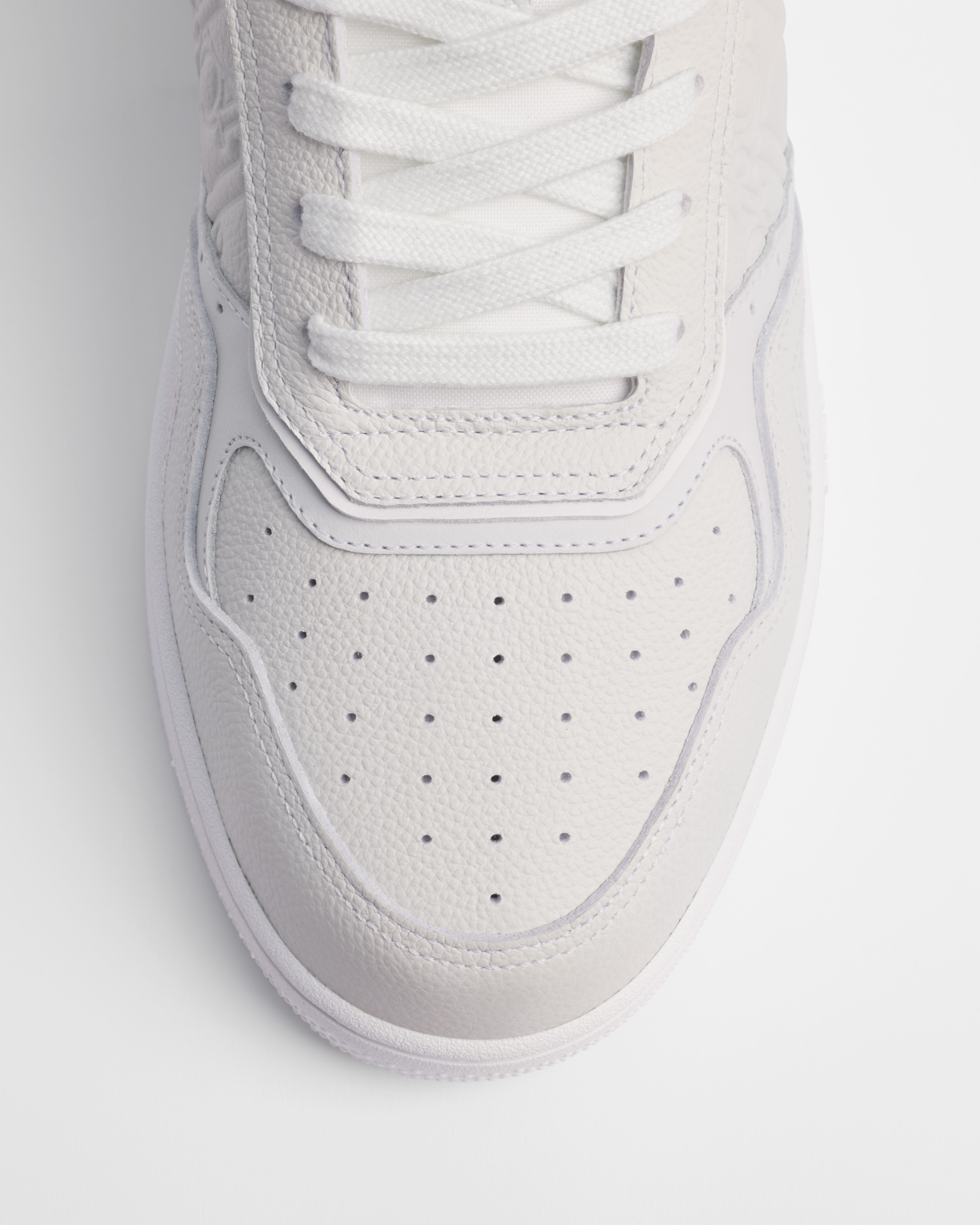 B27 Uptown Low Top Sneaker Genarbtes Kalbsleder in Weiß und Dior Gravity Leder in Weiß E06