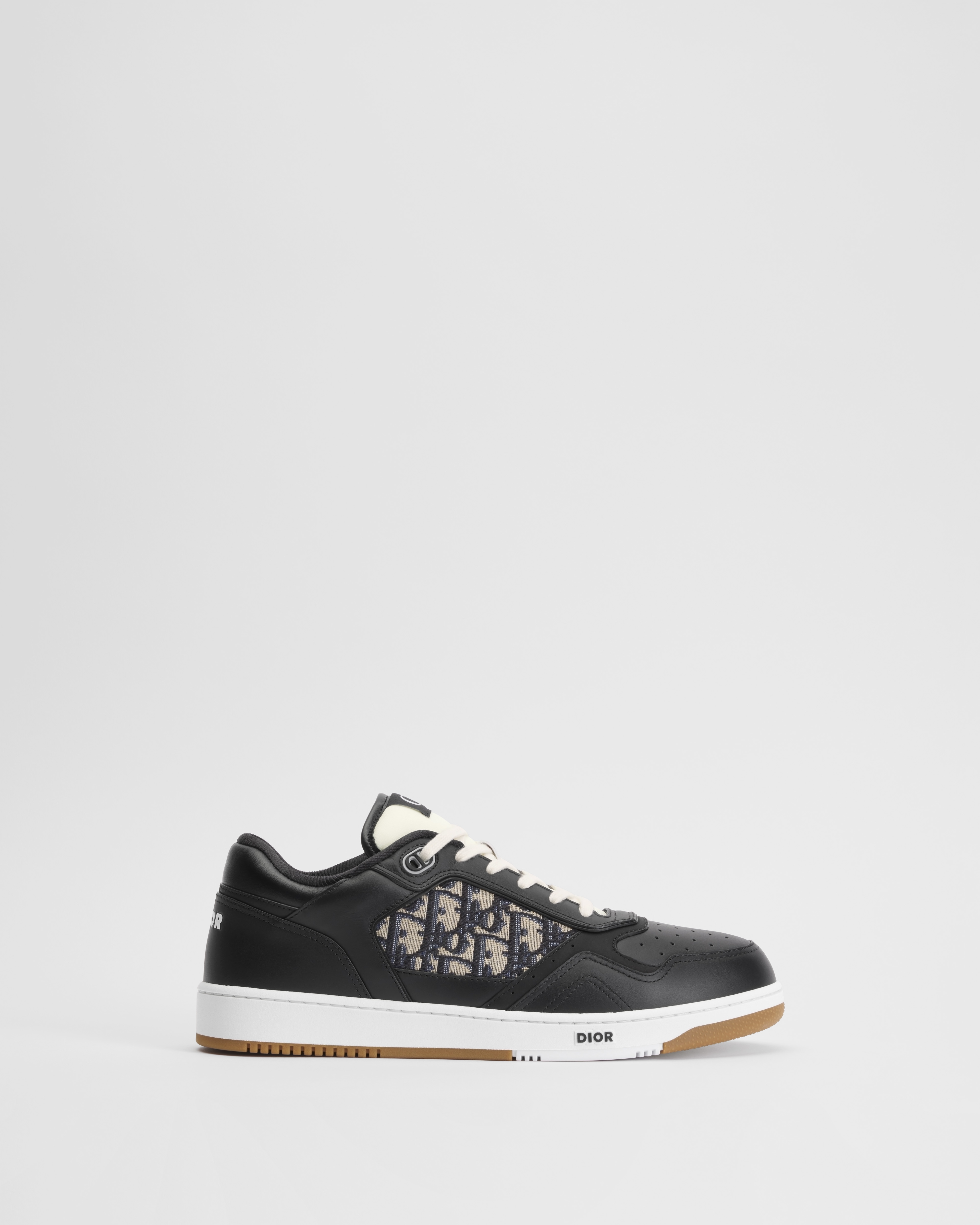 Sneaker B27 Uptown basse Cuir de veau lisse noir et jacquard Dior Oblique beige et noir E02
