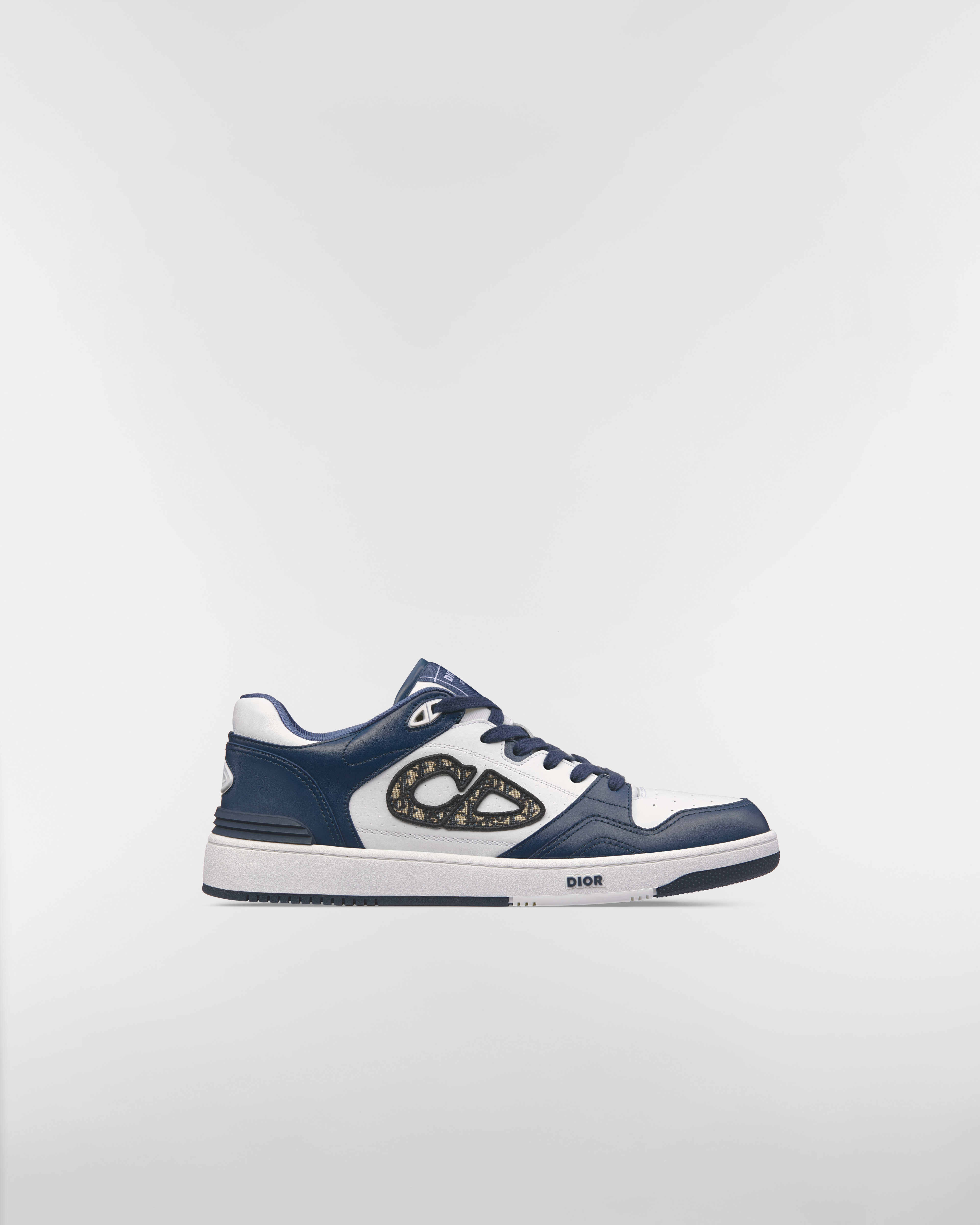 Lage B57 Dribble-sneaker Soepel marineblauw en wit kalfsleer met beige en zwarte Dior Oblique-jacquard E02