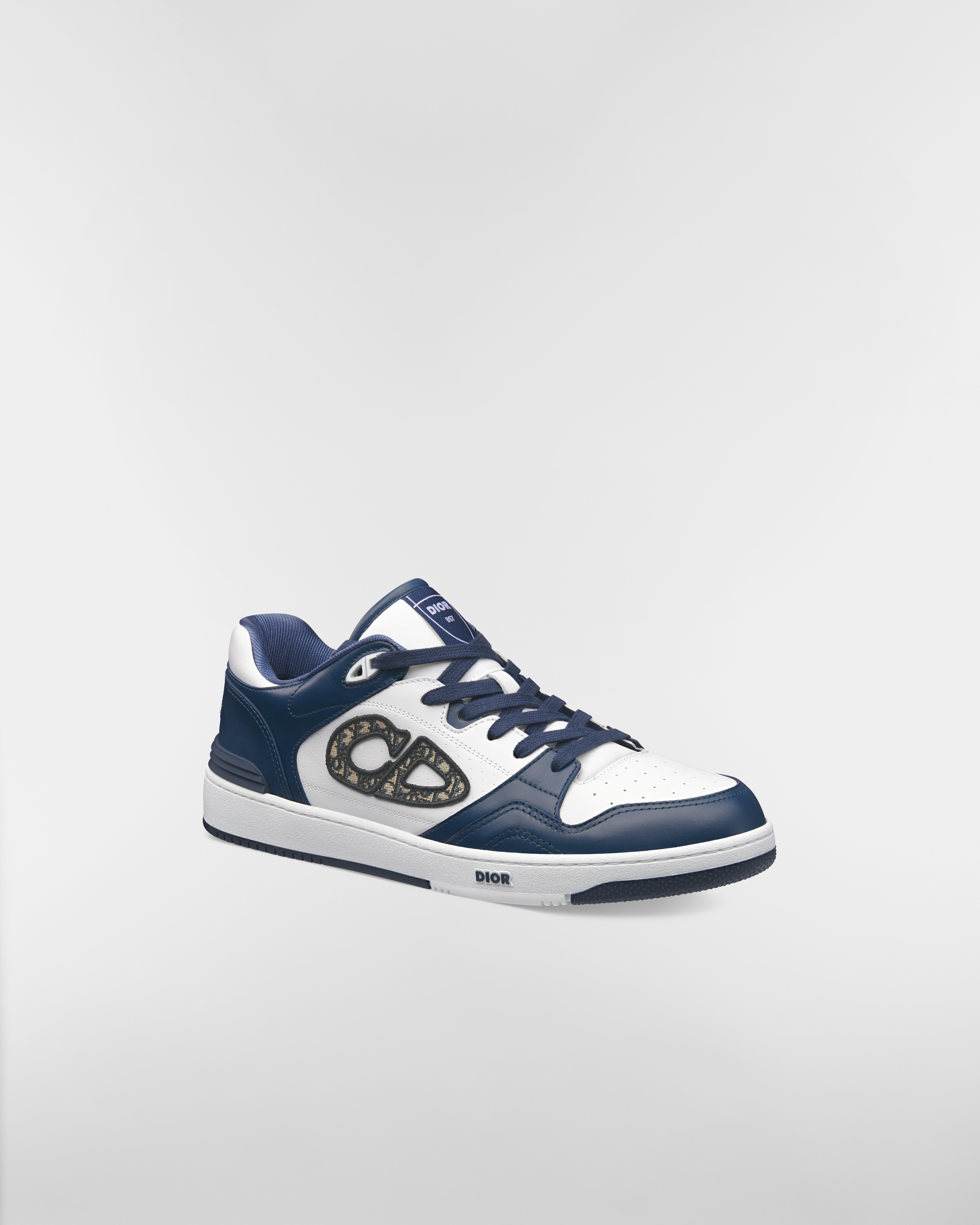 Lage B57 Dribble-sneaker Soepel marineblauw en wit kalfsleer met beige en zwarte Dior Oblique-jacquard E03