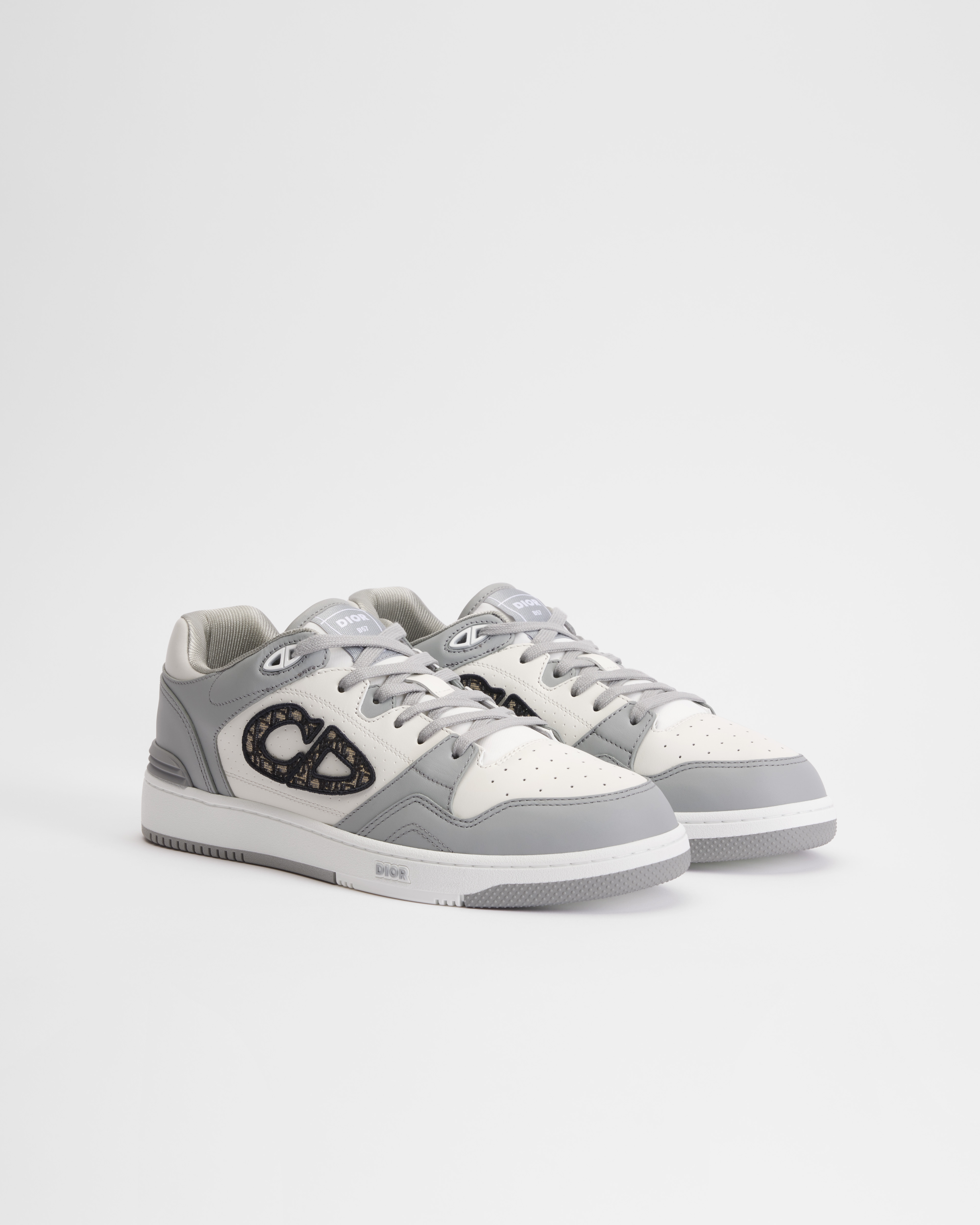 Lage B57 Dribble-sneaker Dior-grijs en wit soepel kalfsleer met beige en zwarte Dior Oblique-jacquard E03