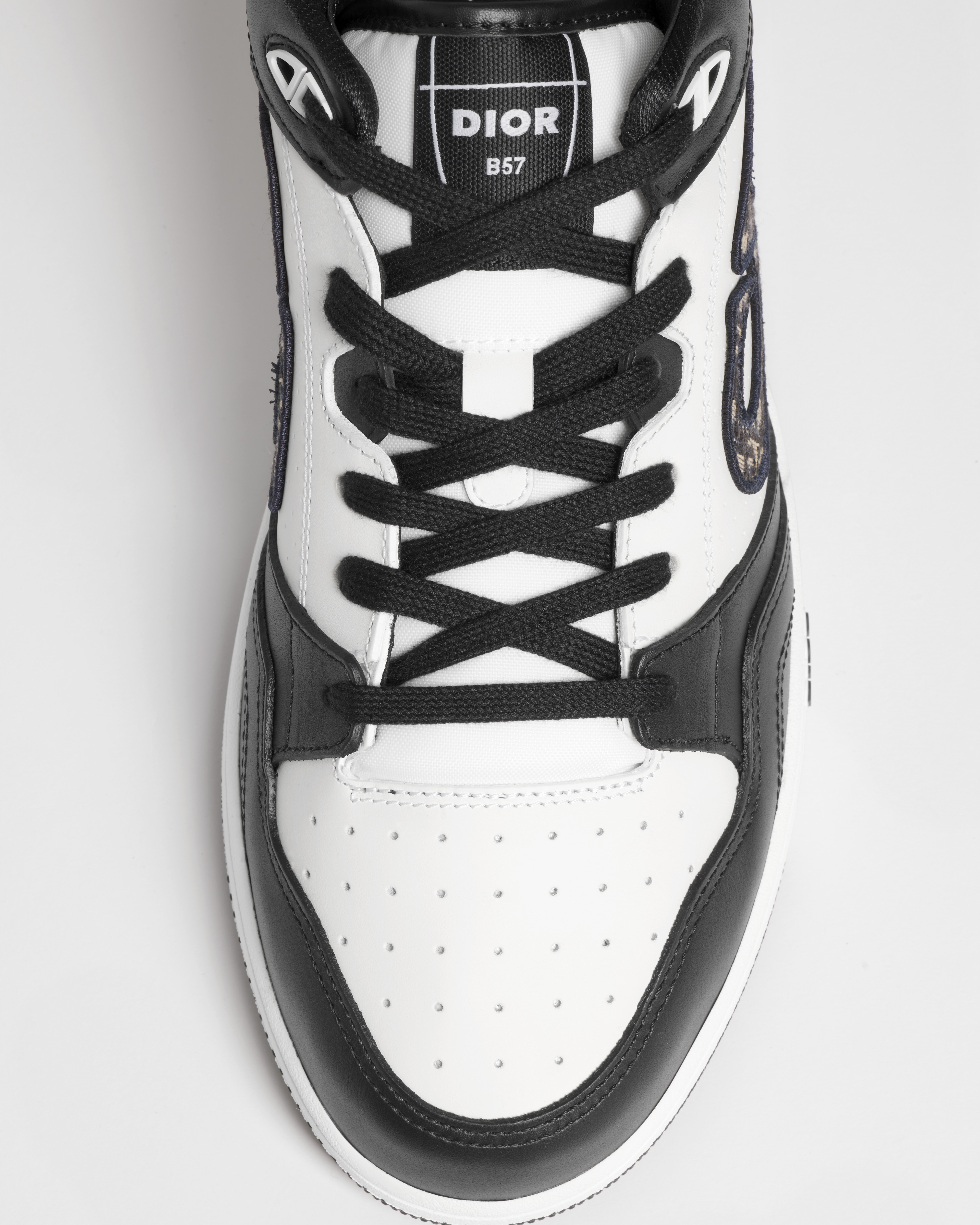 Lage B57 Dribble-sneaker Soepel zwart en wit kalfsleer met beige en zwart jacquardgeweven Dior Oblique-motief E06