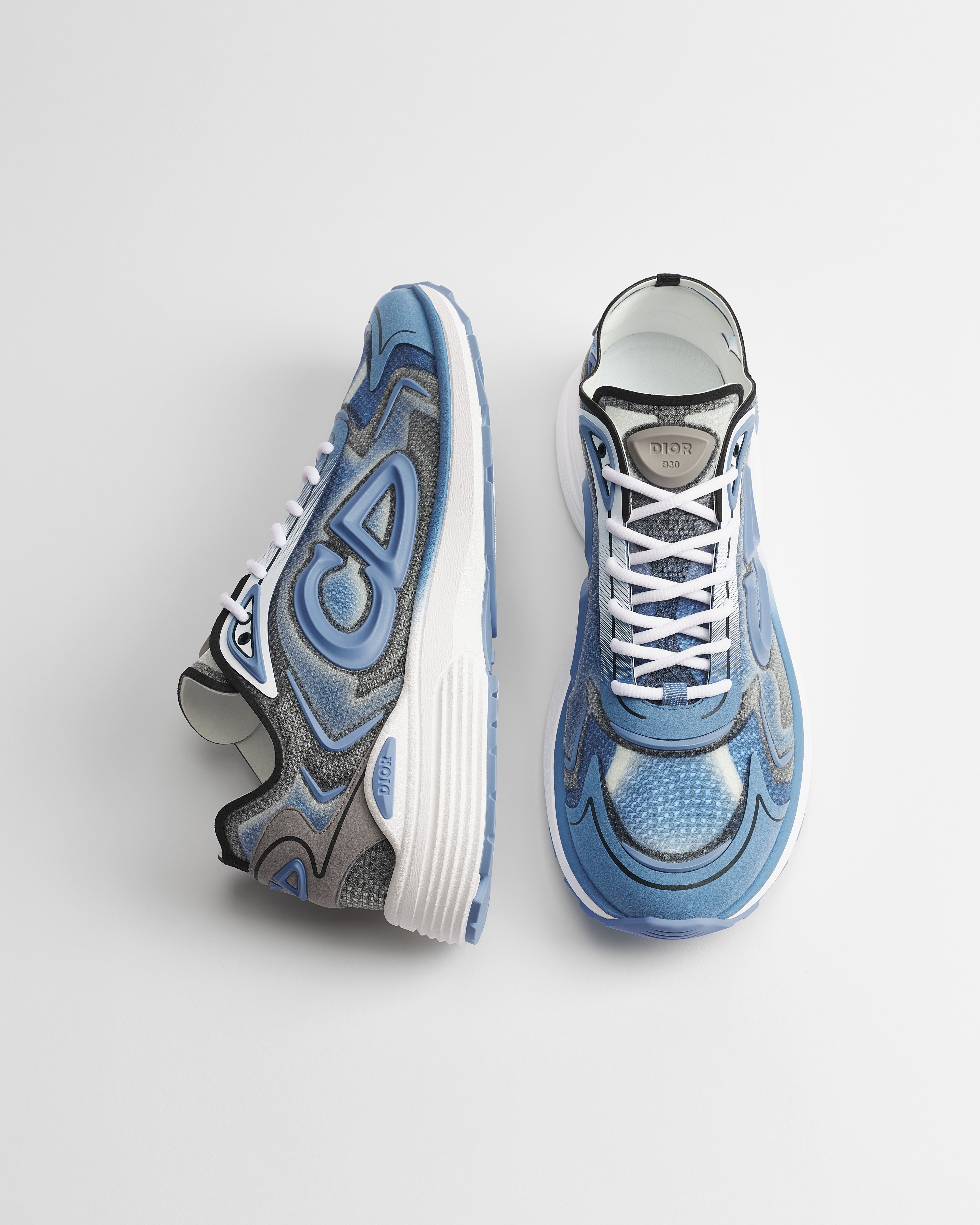 B30 Countdown Tech-sneaker Semi-transparant N3O nylon met blauw kleurverloop, grijze en blauwe technische stof en blauw rubber E06