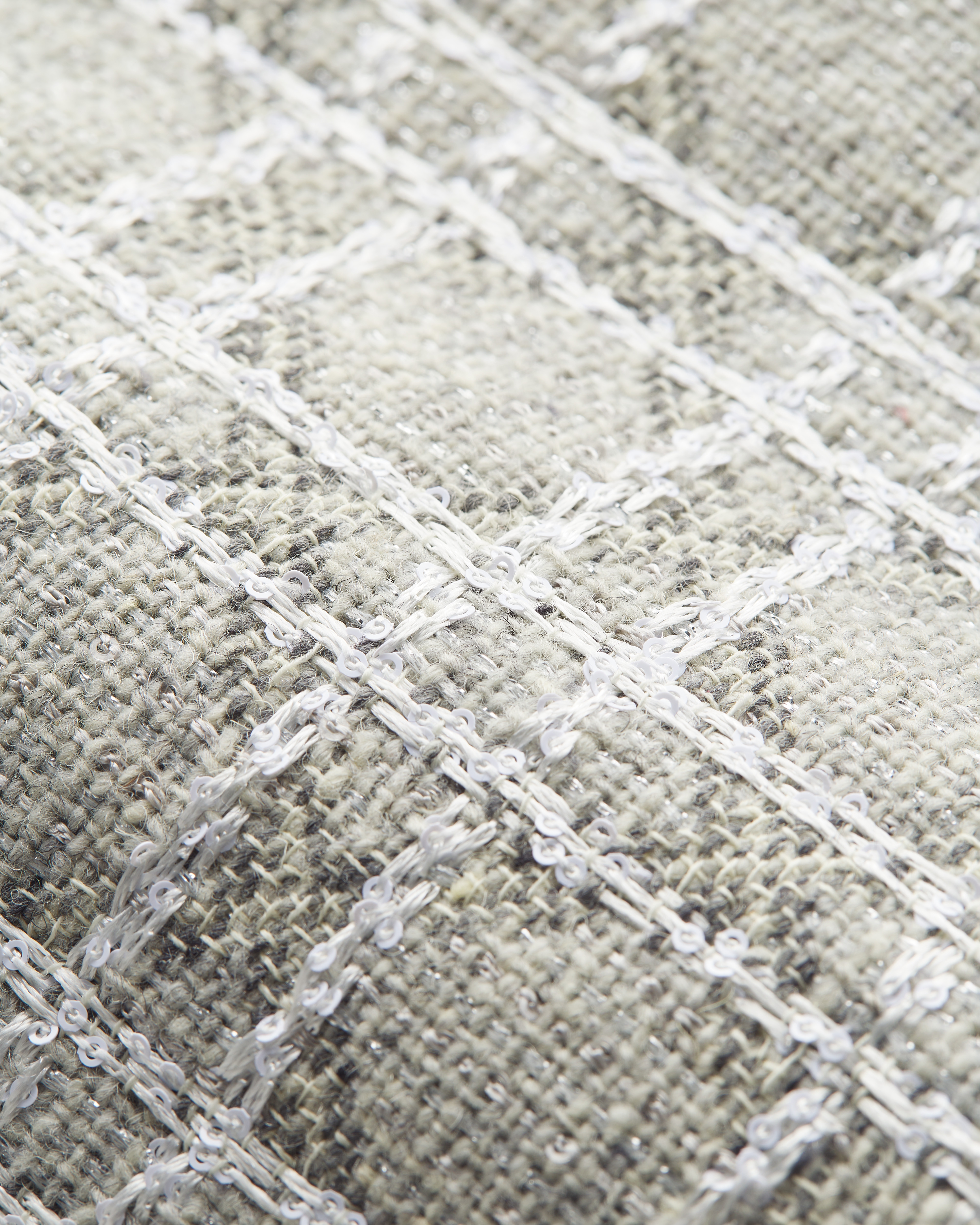Mini jupe Macrocannage Tweed de laine mélangée grise brodée de sequins E10