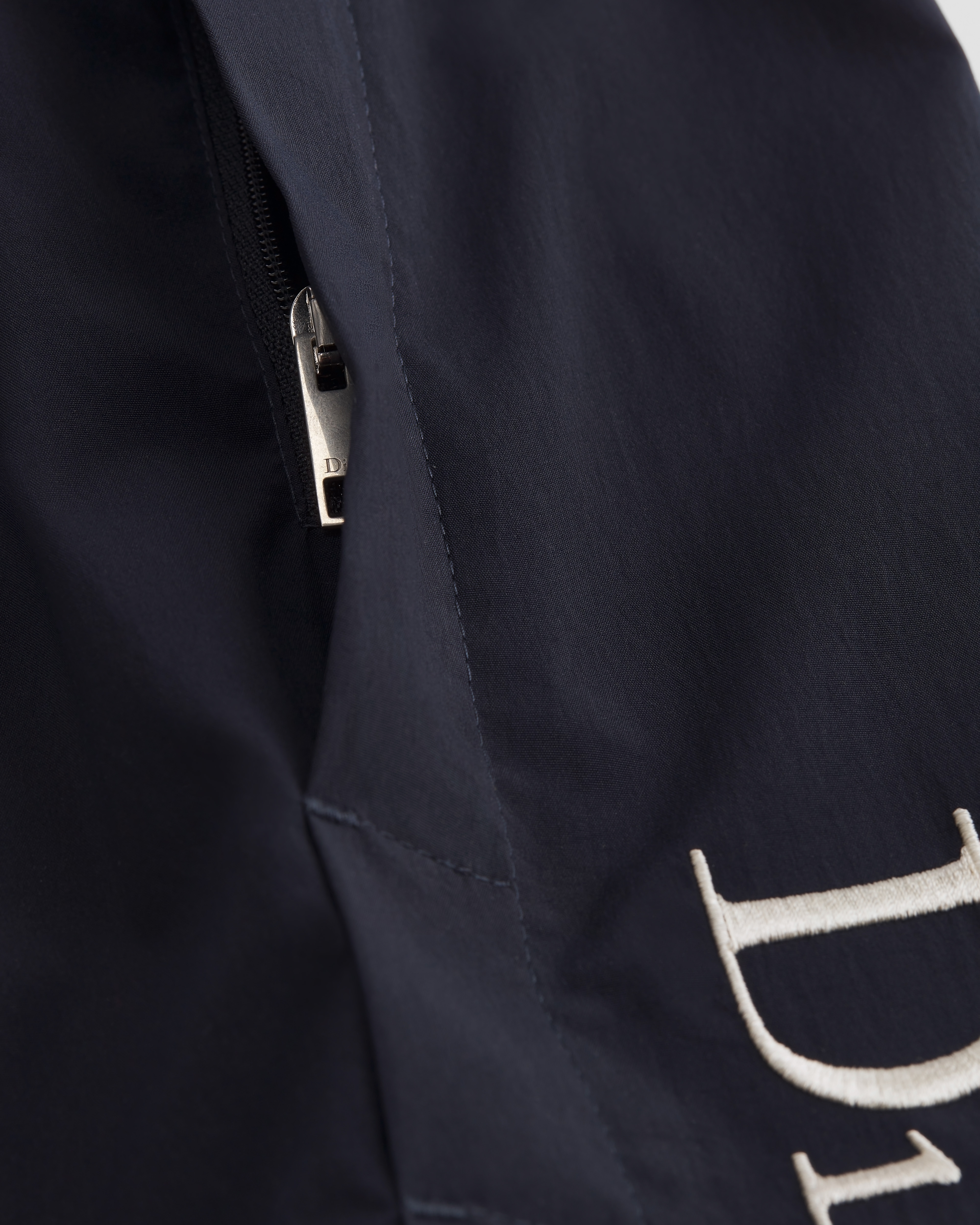 Pantalon de jogging à broderie Dior Montaigne Toile technique bleue E09