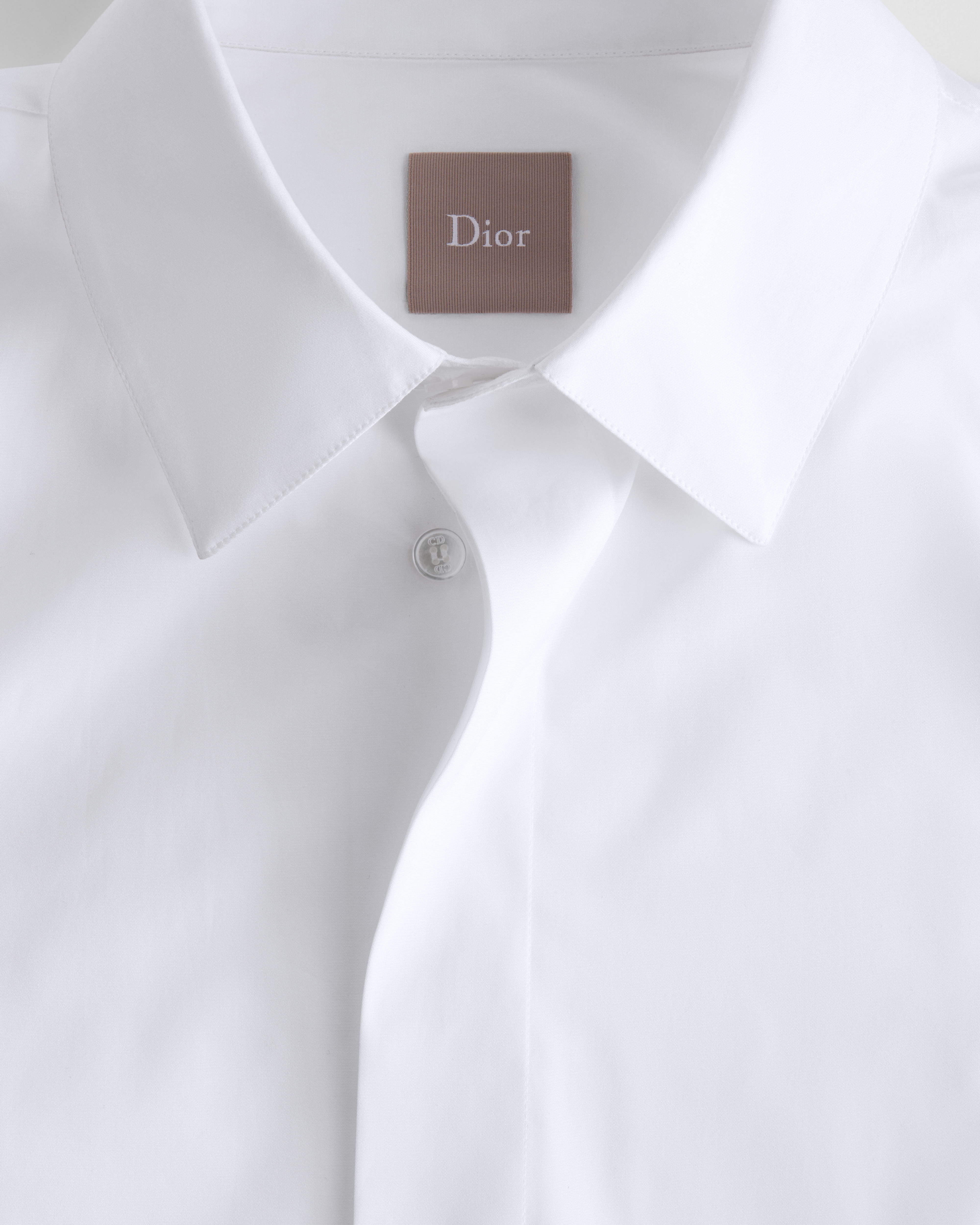 เสื้อเชิ้ตปักลาย Dior ผ้าฝ้ายป๊อปลินสีขาว E10