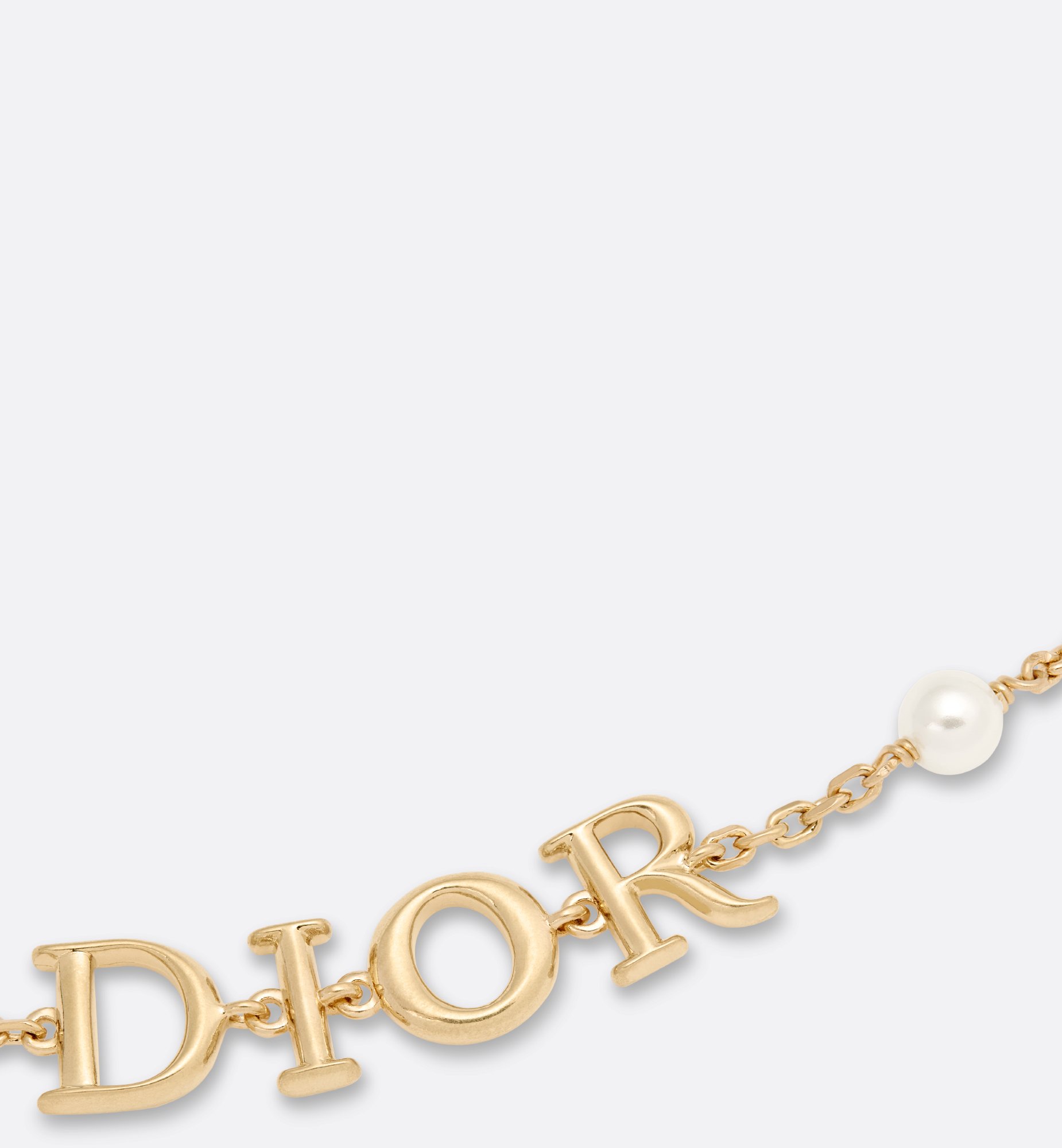 Dio(r)evolution Bracelet Gold-Finish Metal and White Resin Dio(r)evolution Bracelet Gold-Finish Metal and White Resin
