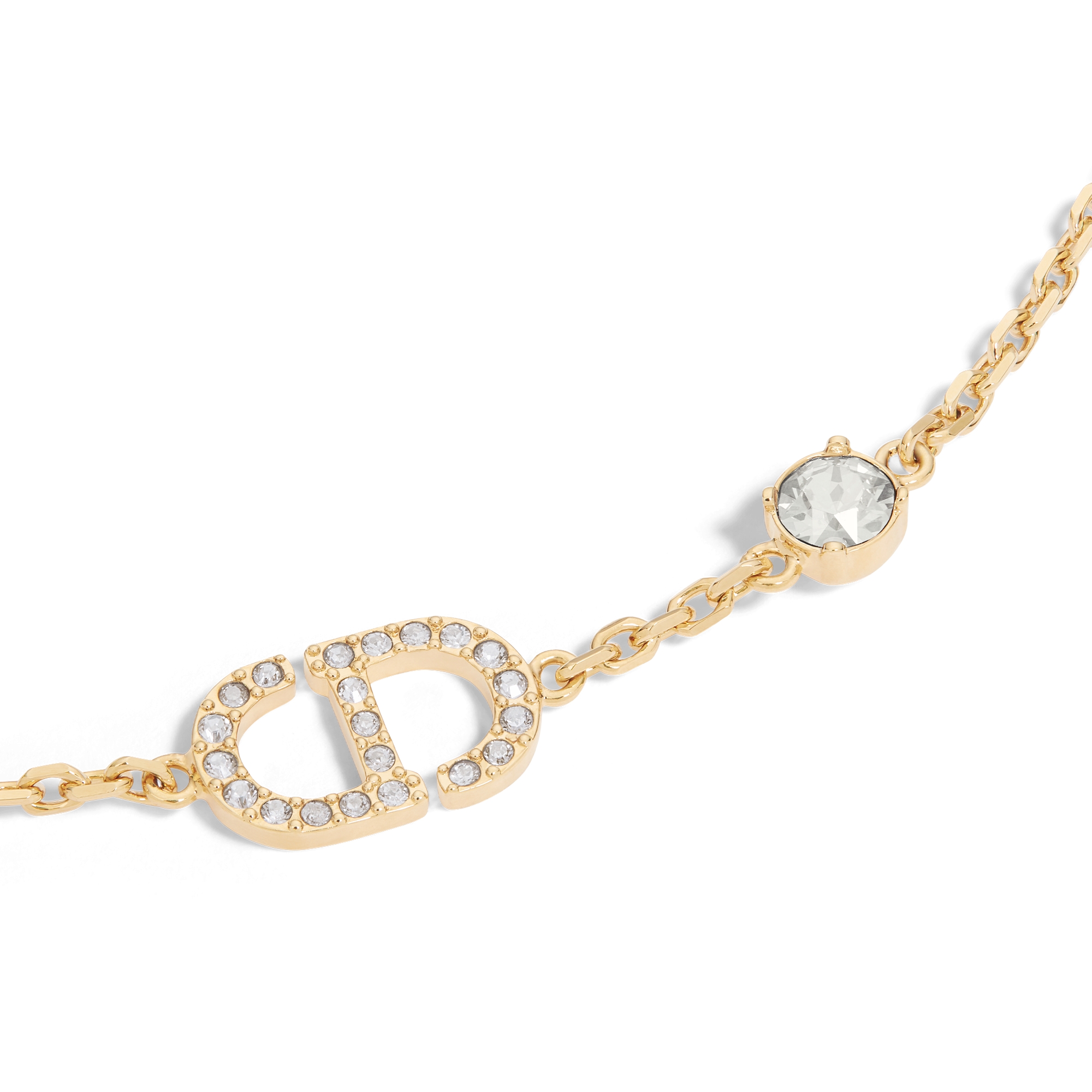 Pulseira Petit CD Metal com acabamento dourado e cristais brancos E09