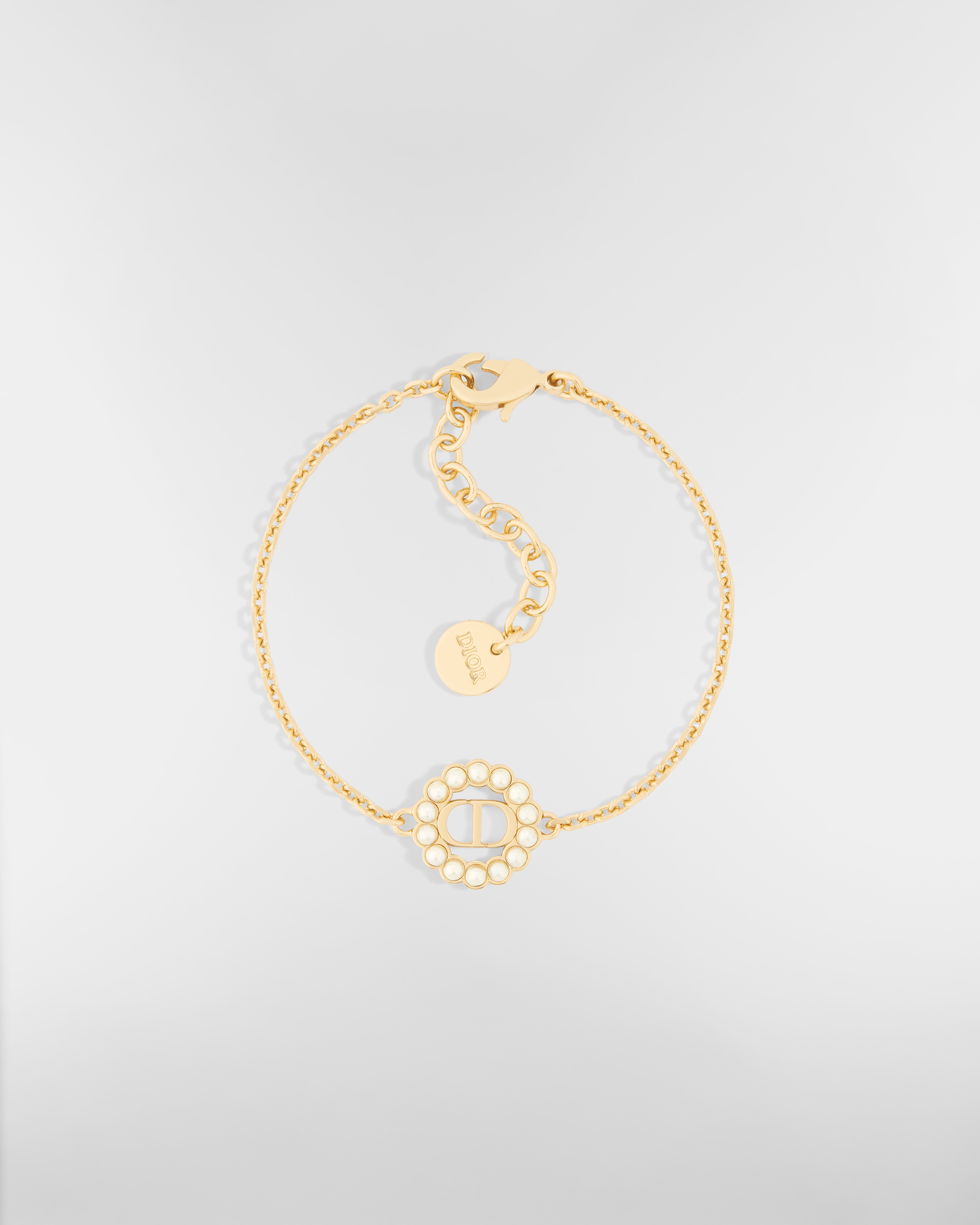 Bracciale Petit CD Circle Metallo con finitura color oro e perle in resina bianca E01