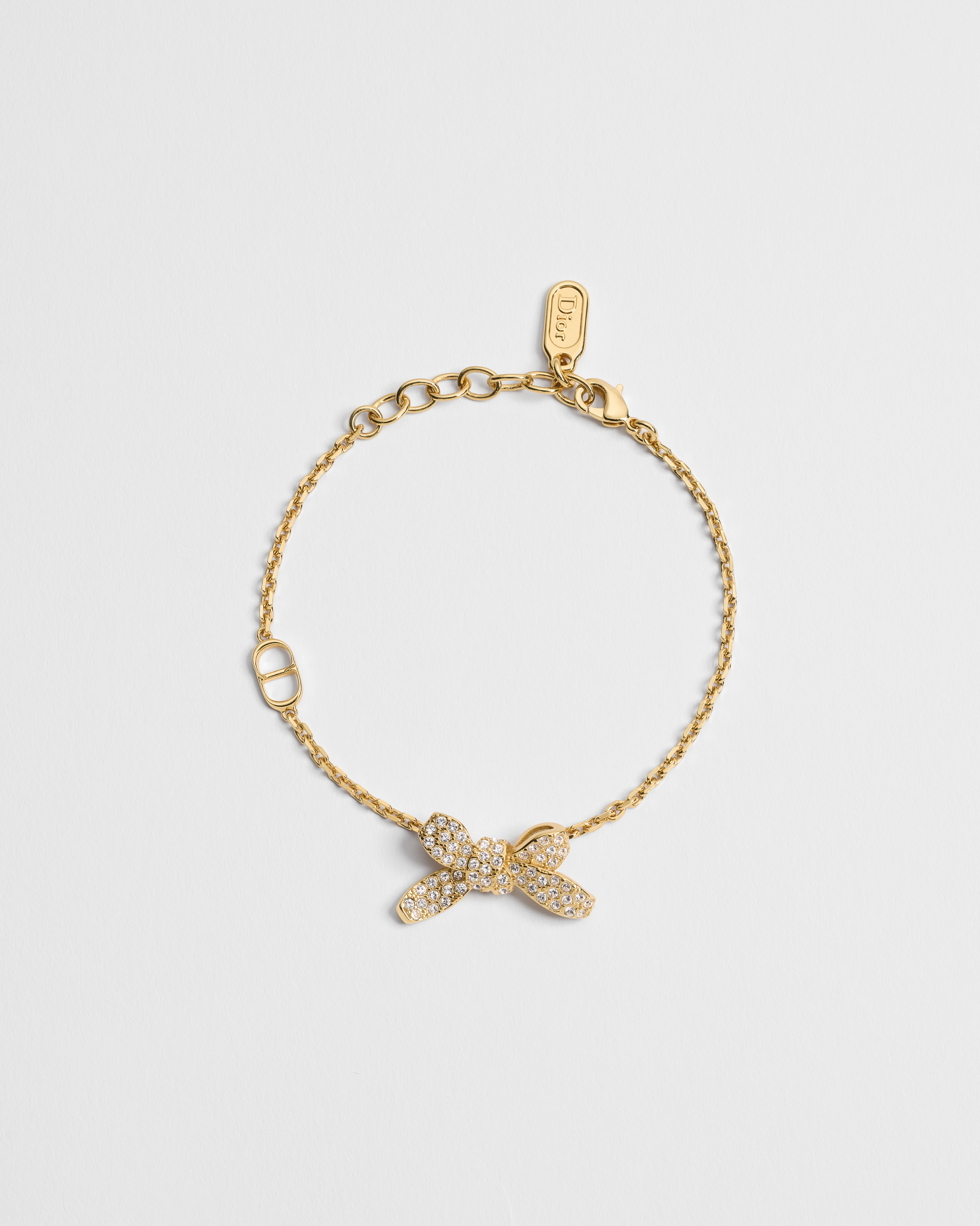 Delicate Bow Armband Metall mit Gold-Finish und Kristalle E01