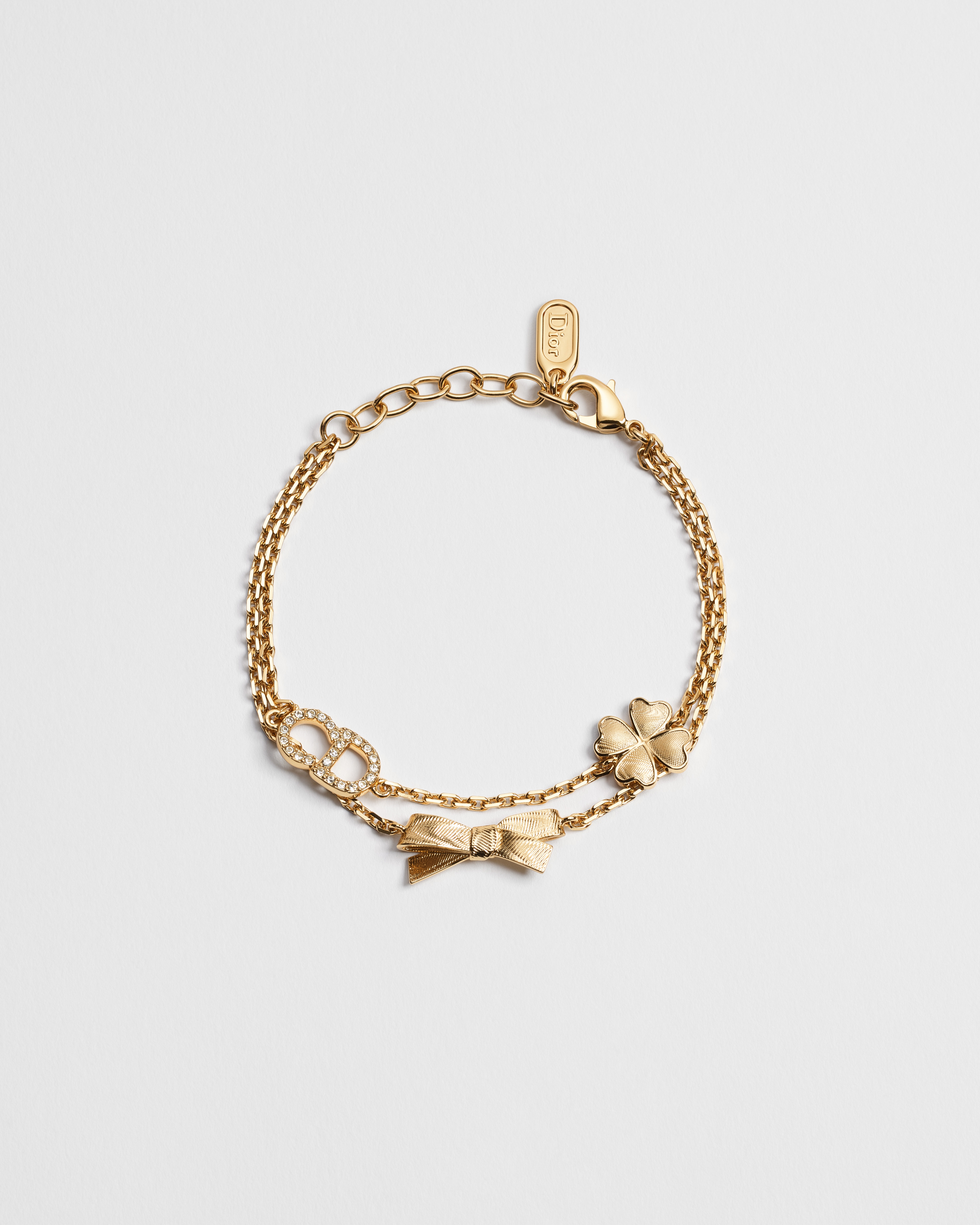 CD Bow Bracelet Gold-Finish Metal and Crystals E01