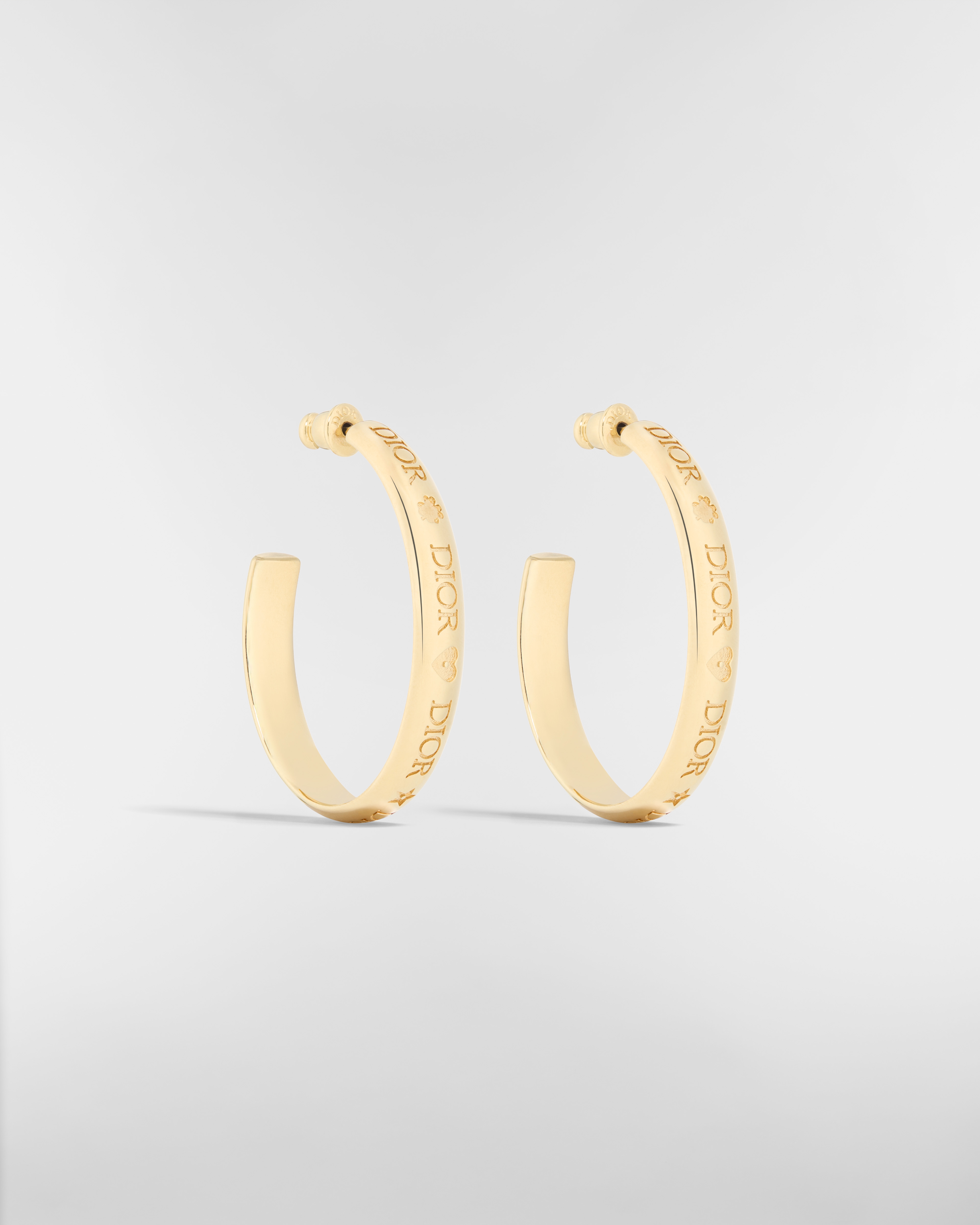 Brincos de argola Dior Trésor Metal com acabamento dourado E03