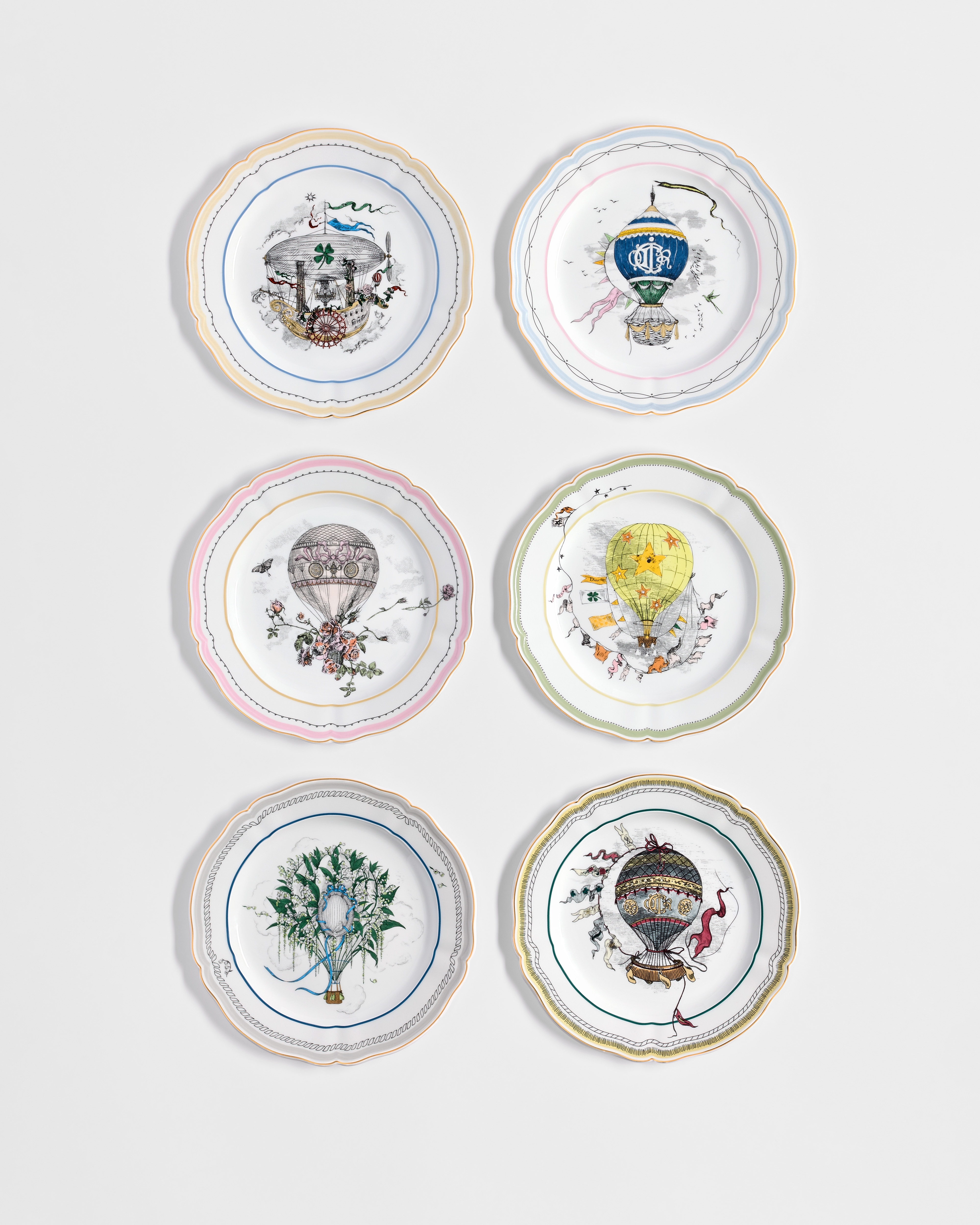 Set of Six Dessert Plates White Limoges Porcelain with Multicolor Le Fantastique Voyage de Monsieur Dior Motif and 24-Carat Gold E06