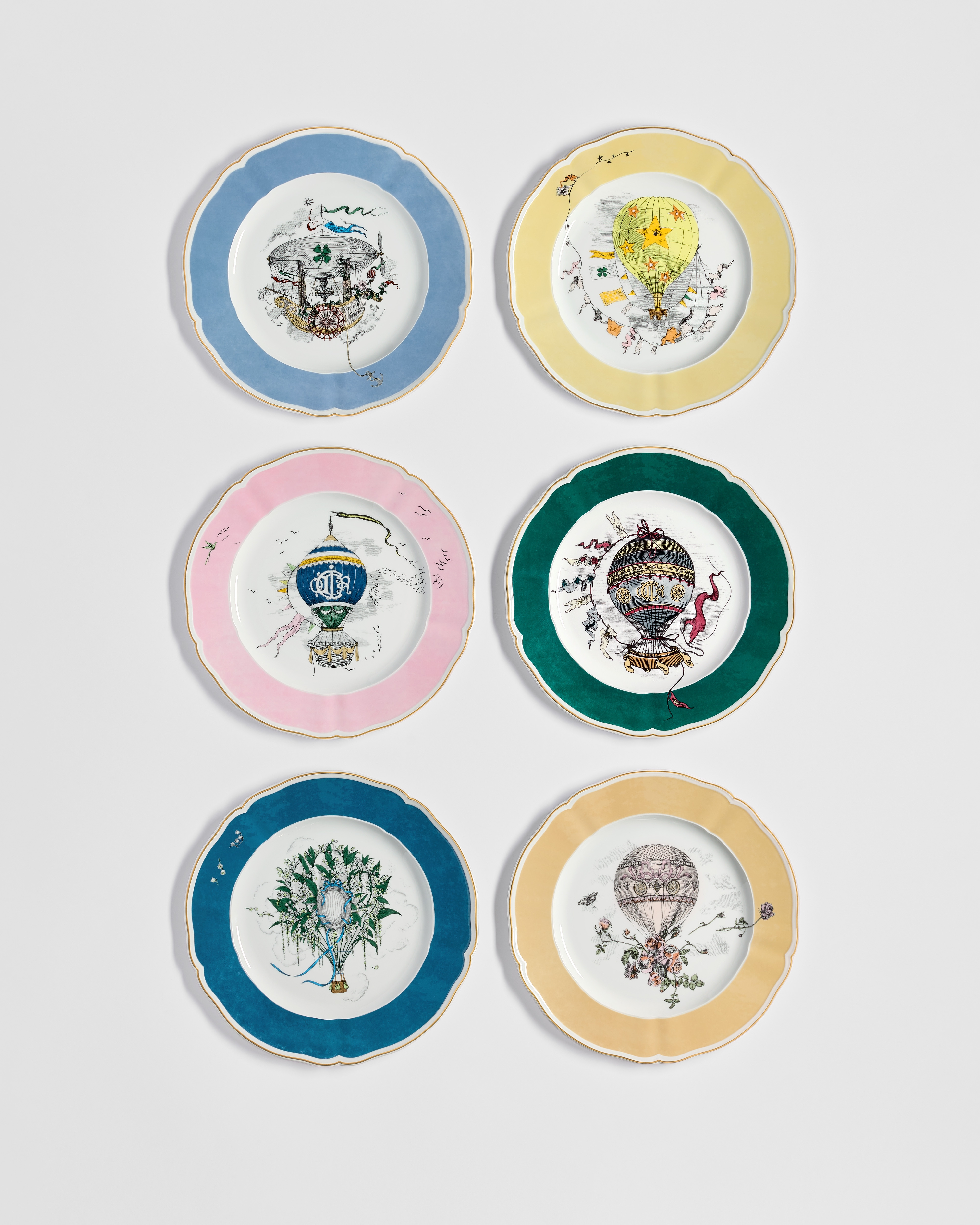 Set of Six Dinner Plates White Limoges Porcelain with Multicolor Le Fantastique Voyage de Monsieur Dior Motif and 24-Carat Gold E06