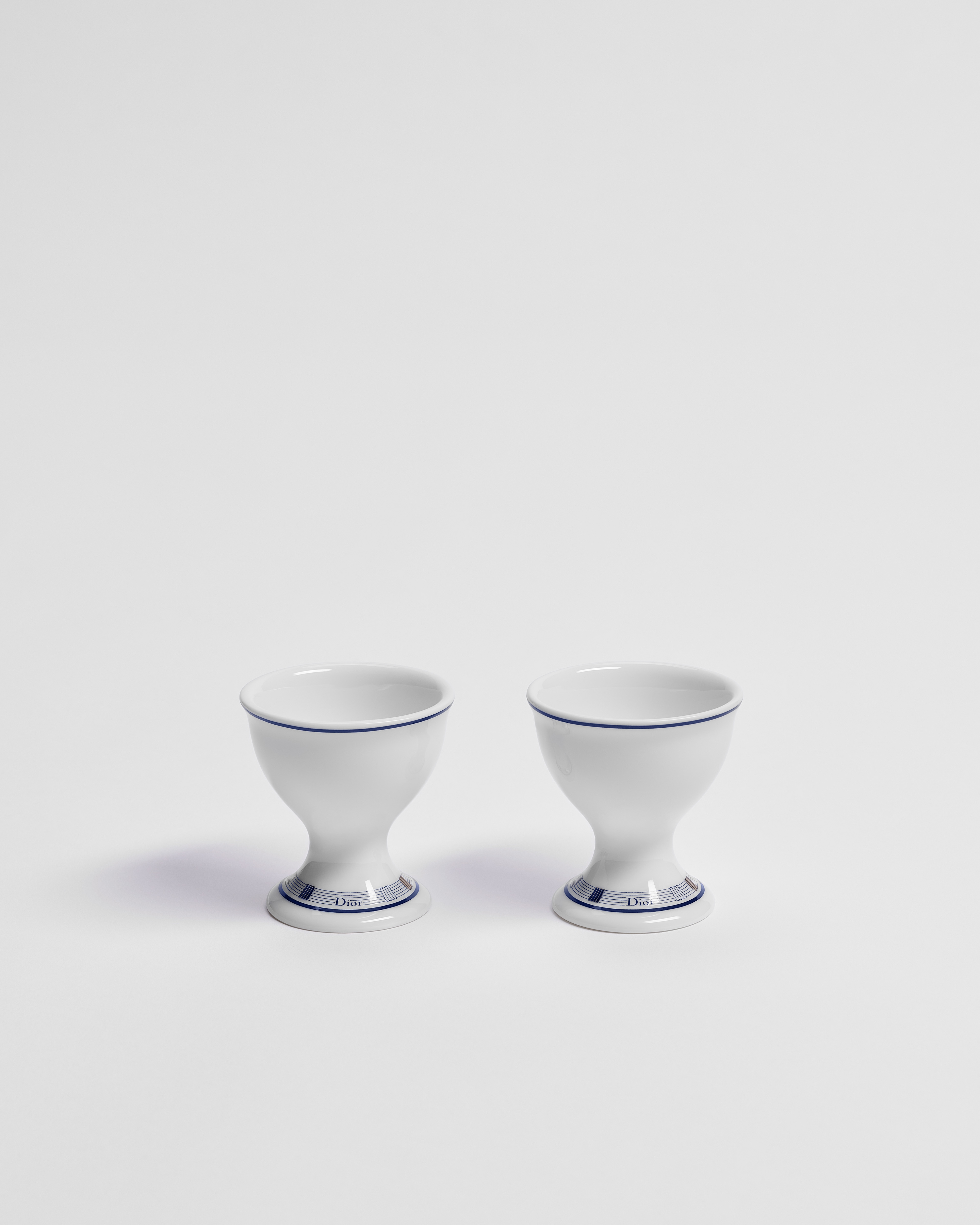 Set de 2 coquetiers Porcelaine de Limoges blanche à motif Godron bleu E02