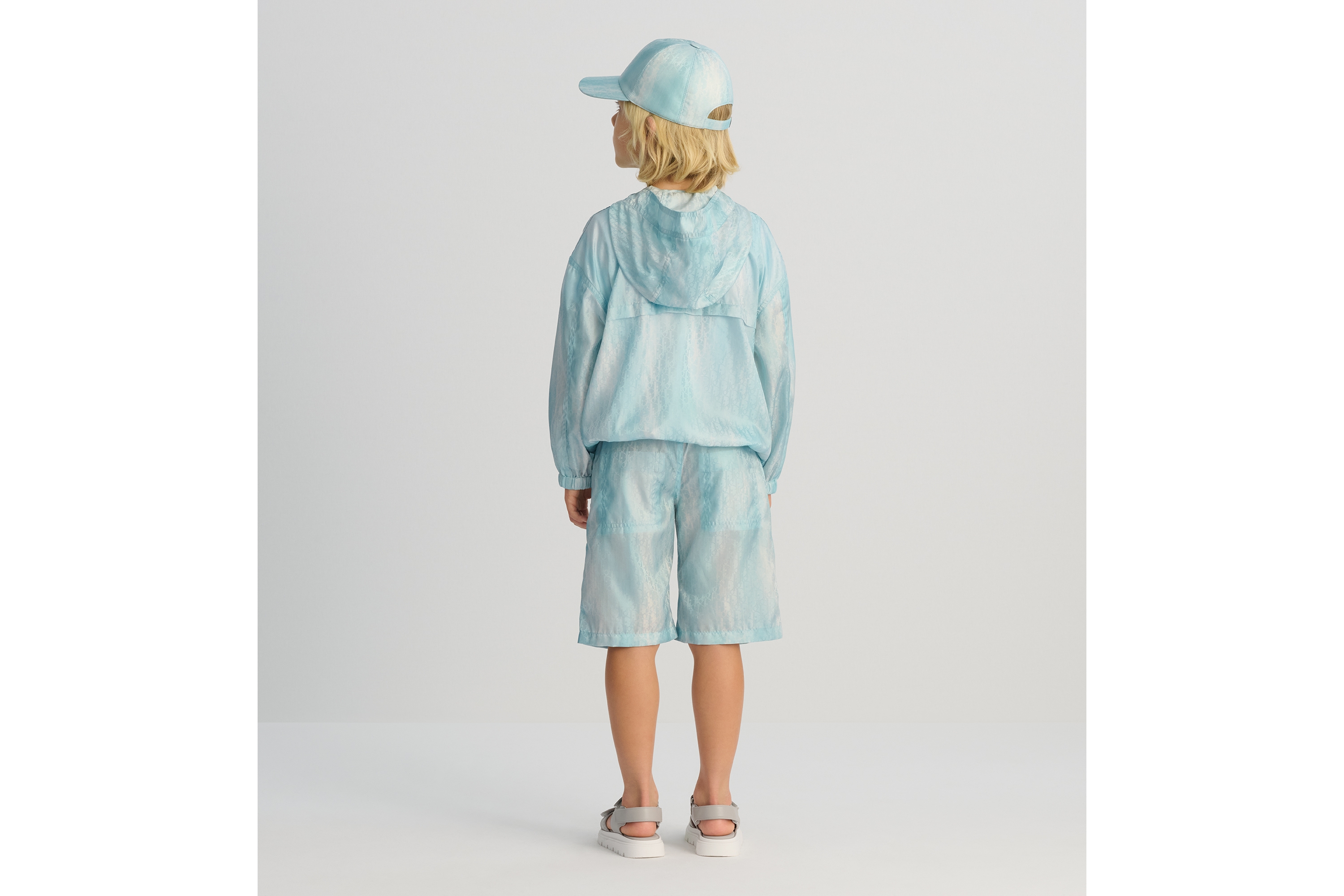 look_image_alt_prefix Windbreaker met capuchon voor kinderen Groene en blauwe, waterafstotende technische jacquard met Dior Oblique-motief E04
