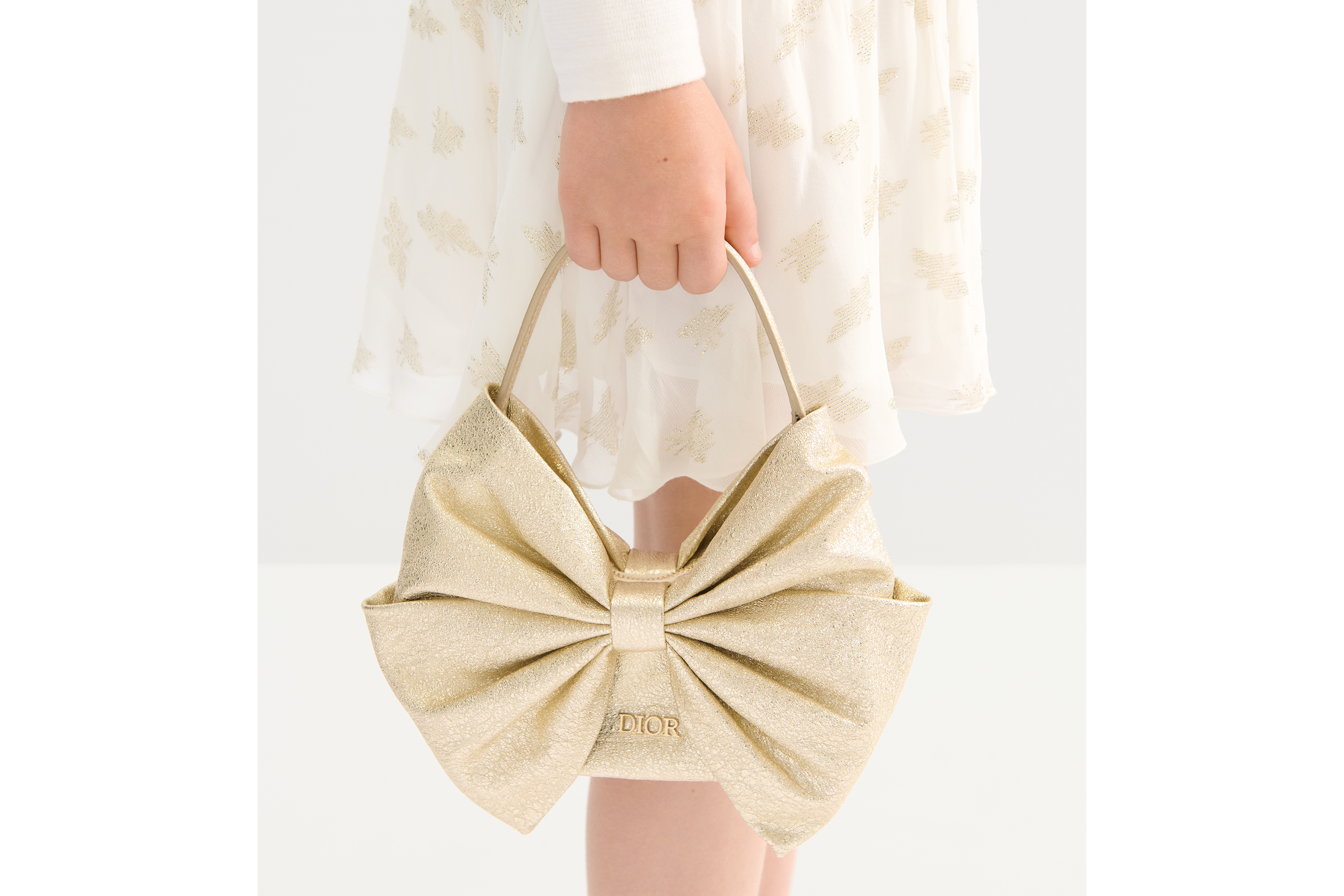 Look Sac nœud enfant Cuir d'agneau métallisé doré E20