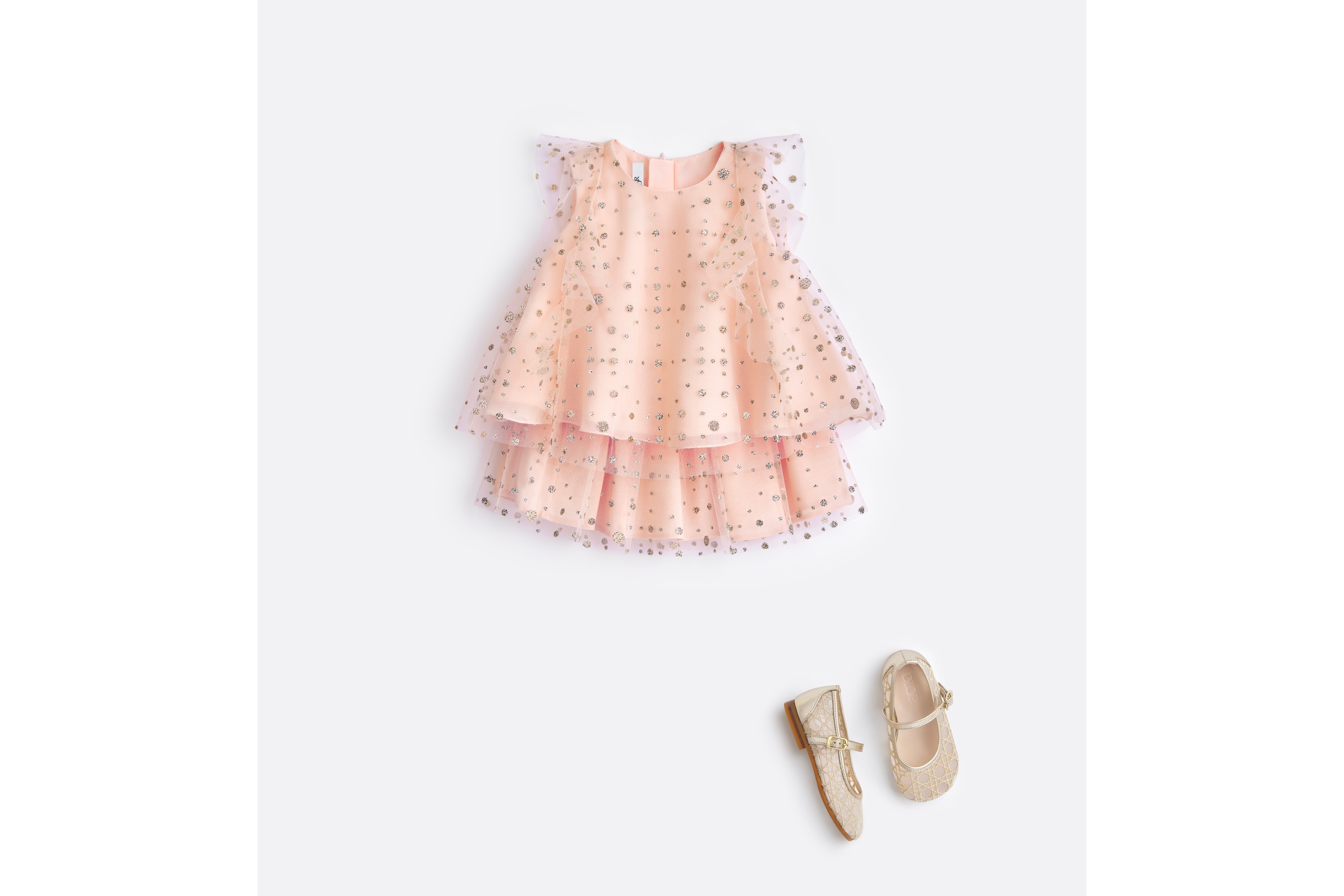 look_image_alt_prefix تنورة قصيرة للأطفال الرضّع تول بلون زهر الخوخ مع نقاط بولكا باللون الذهبي البرّاق E08