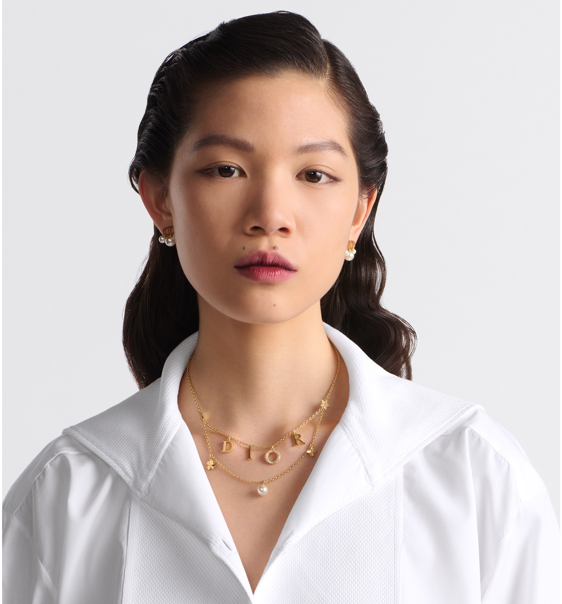 Dio(r)evolution Necklace Gold-Finish Metal with a White Resin 