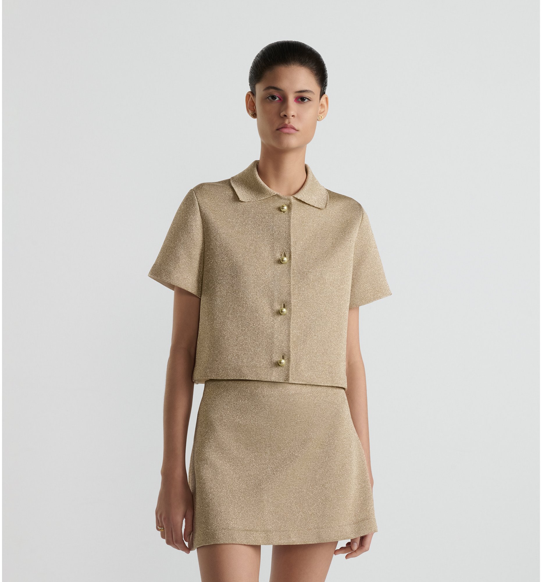 aria_look Mini jupe Dior Or Vue de 3/4 face 