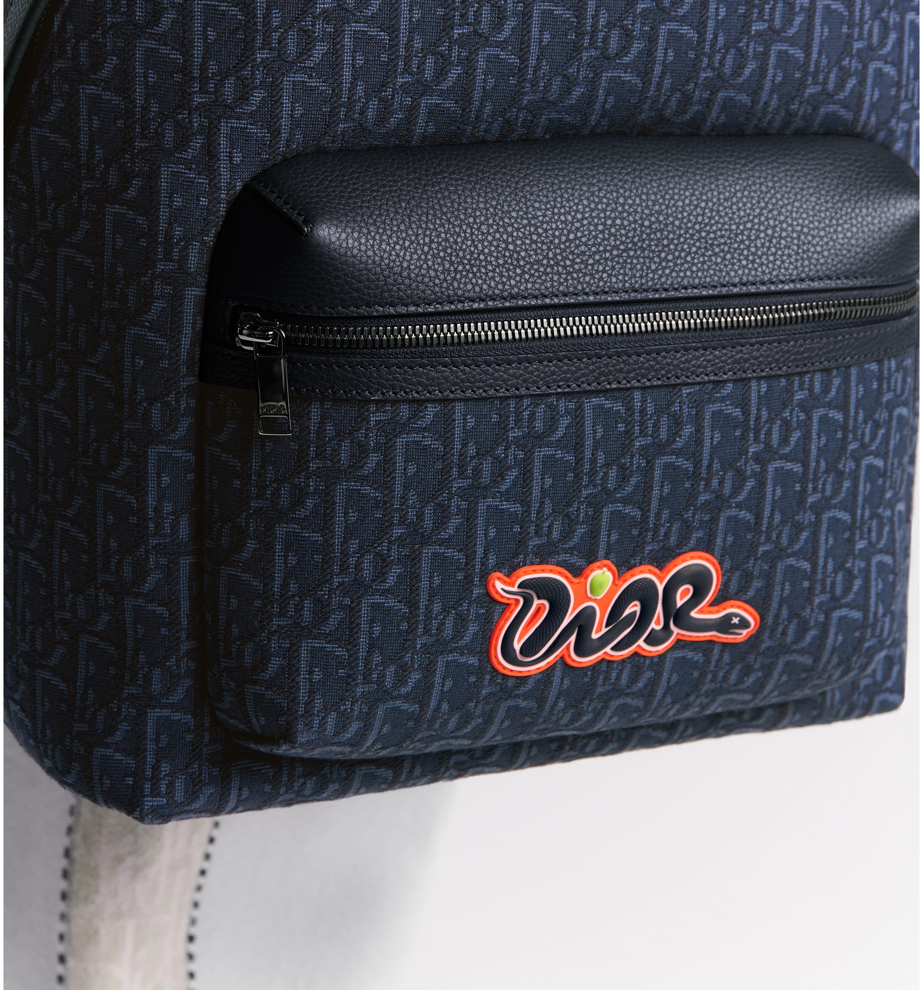 aria_look DIOR AND KAWS Rider 2.0 Zipped Backpack