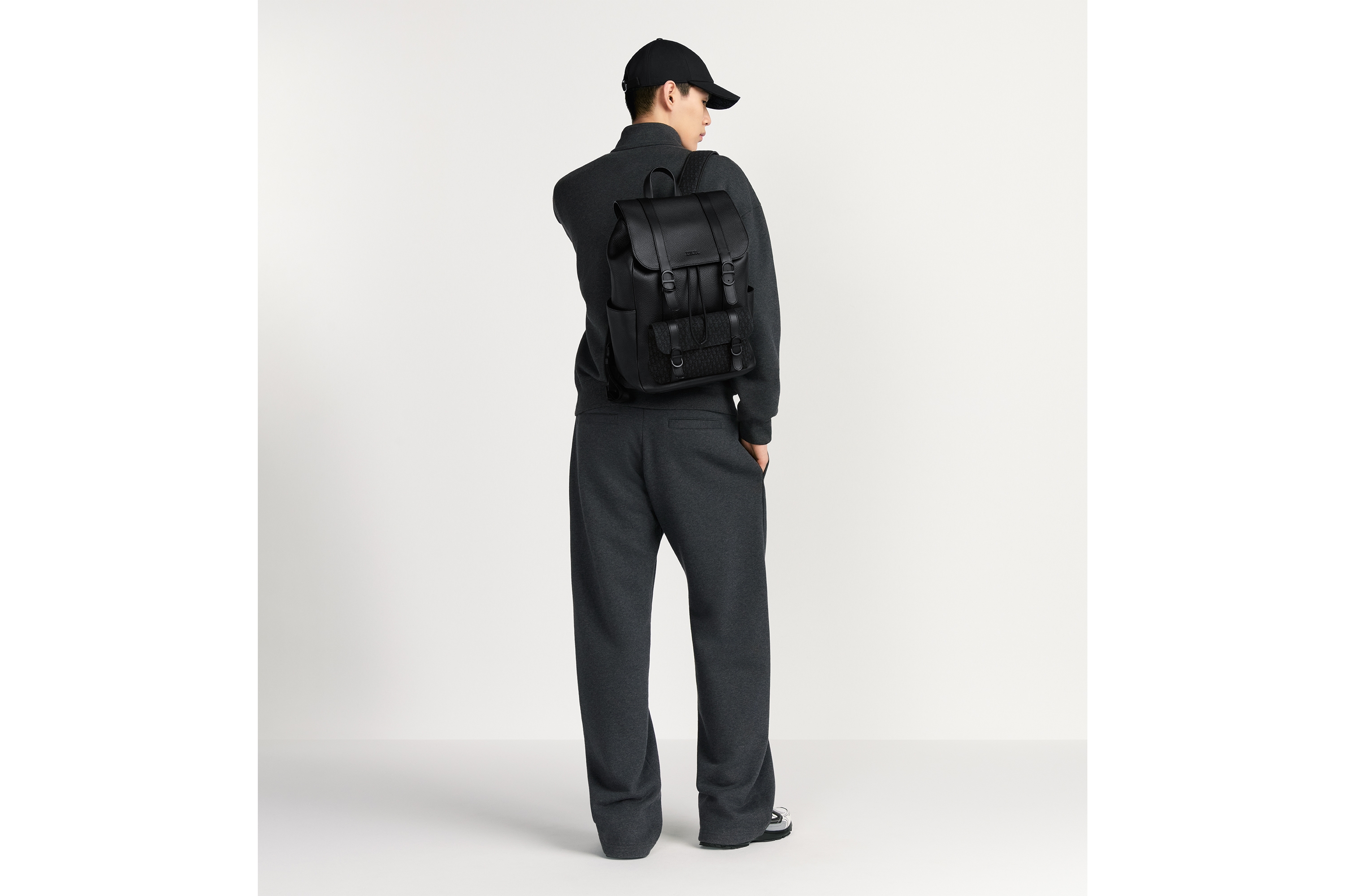 Look Dior Daily Backpack with Flap Black Grained Calfskin, Black Taurillon Leather and Black Micro Dior Oblique Jacquard E21