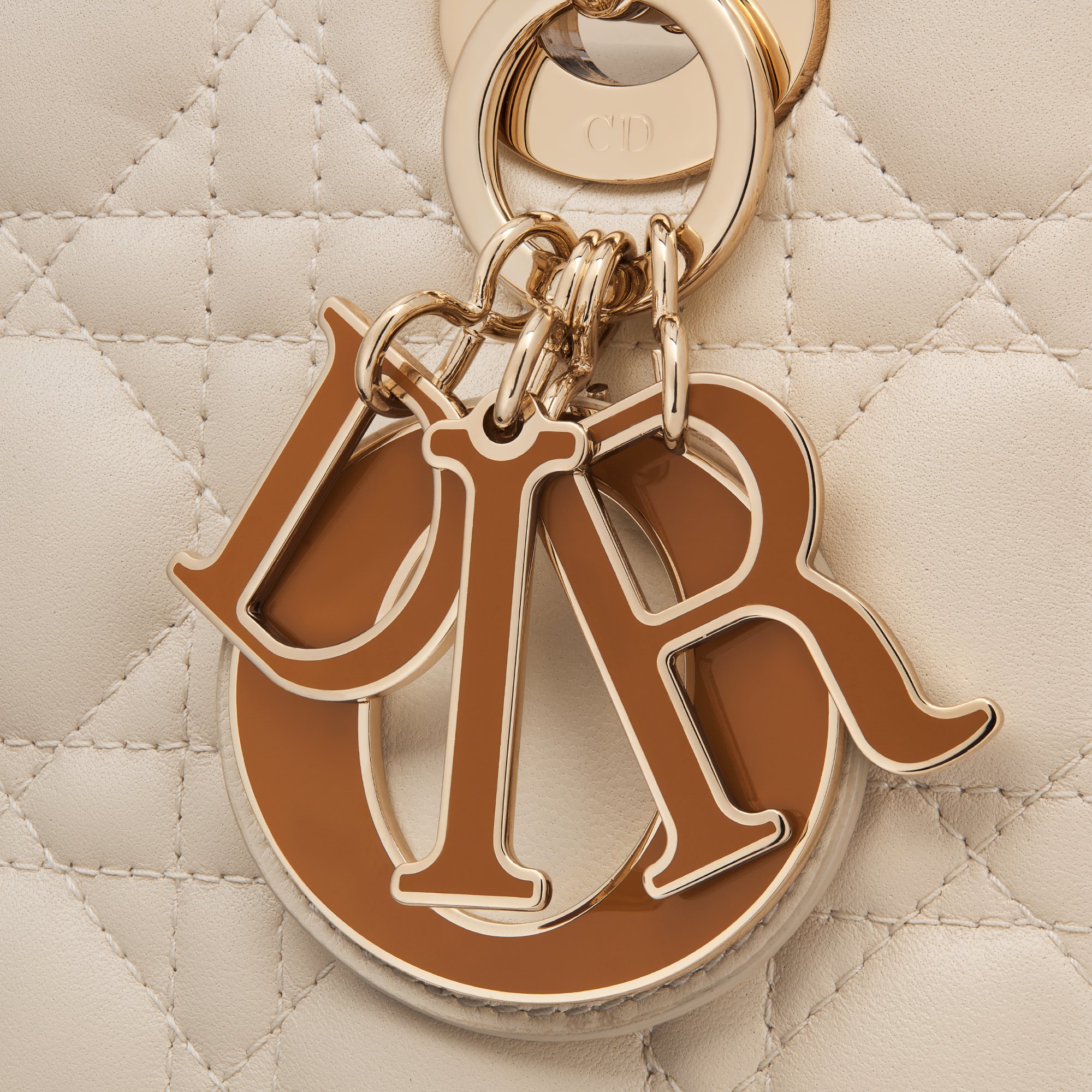 Gold lady dior bag hotsell