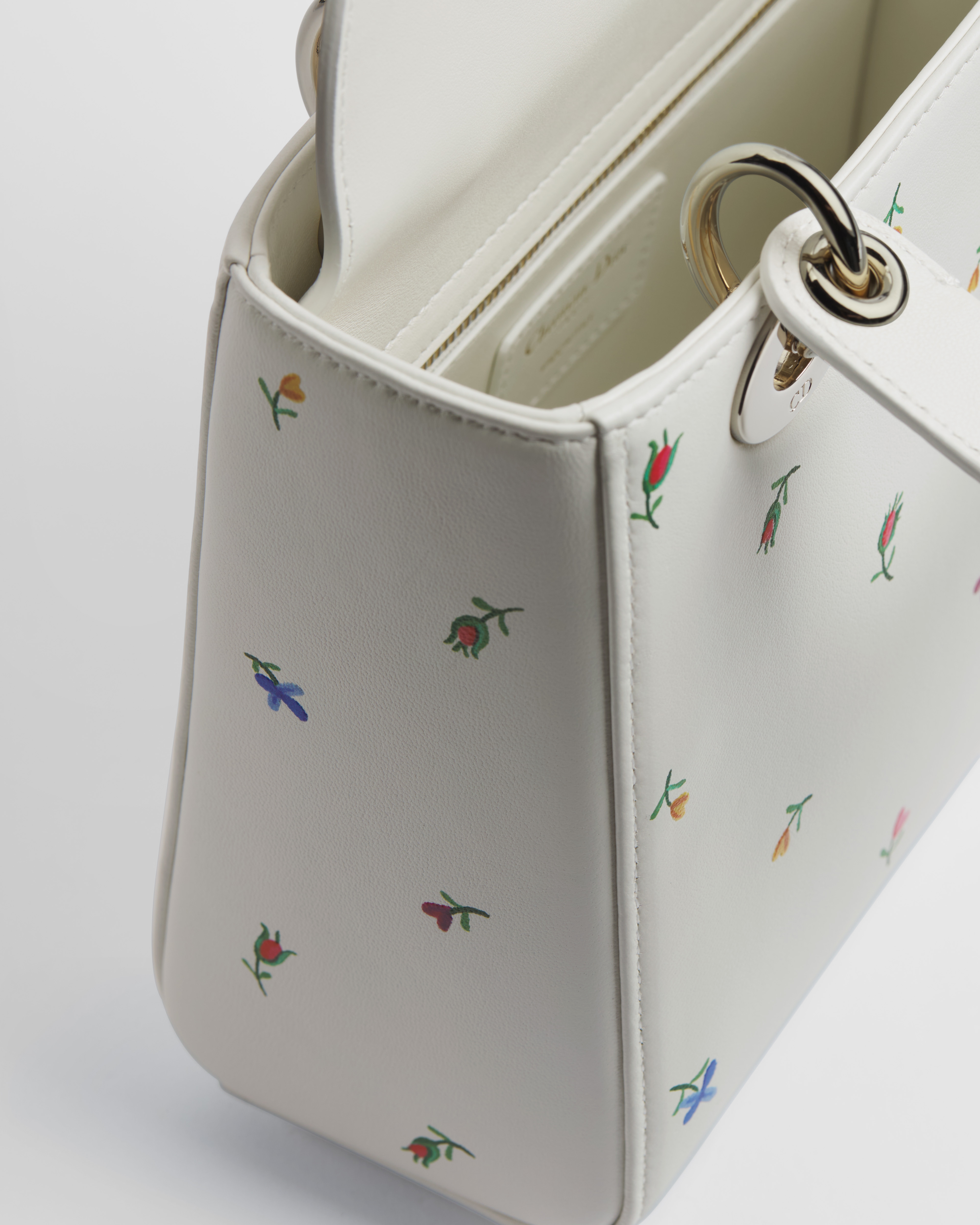 Kleine Dioramour Lady Dior Tasche mit Trageriemen Lammleder in Weiß mit Revolution Flowers Motiv in mehreren Farben E11