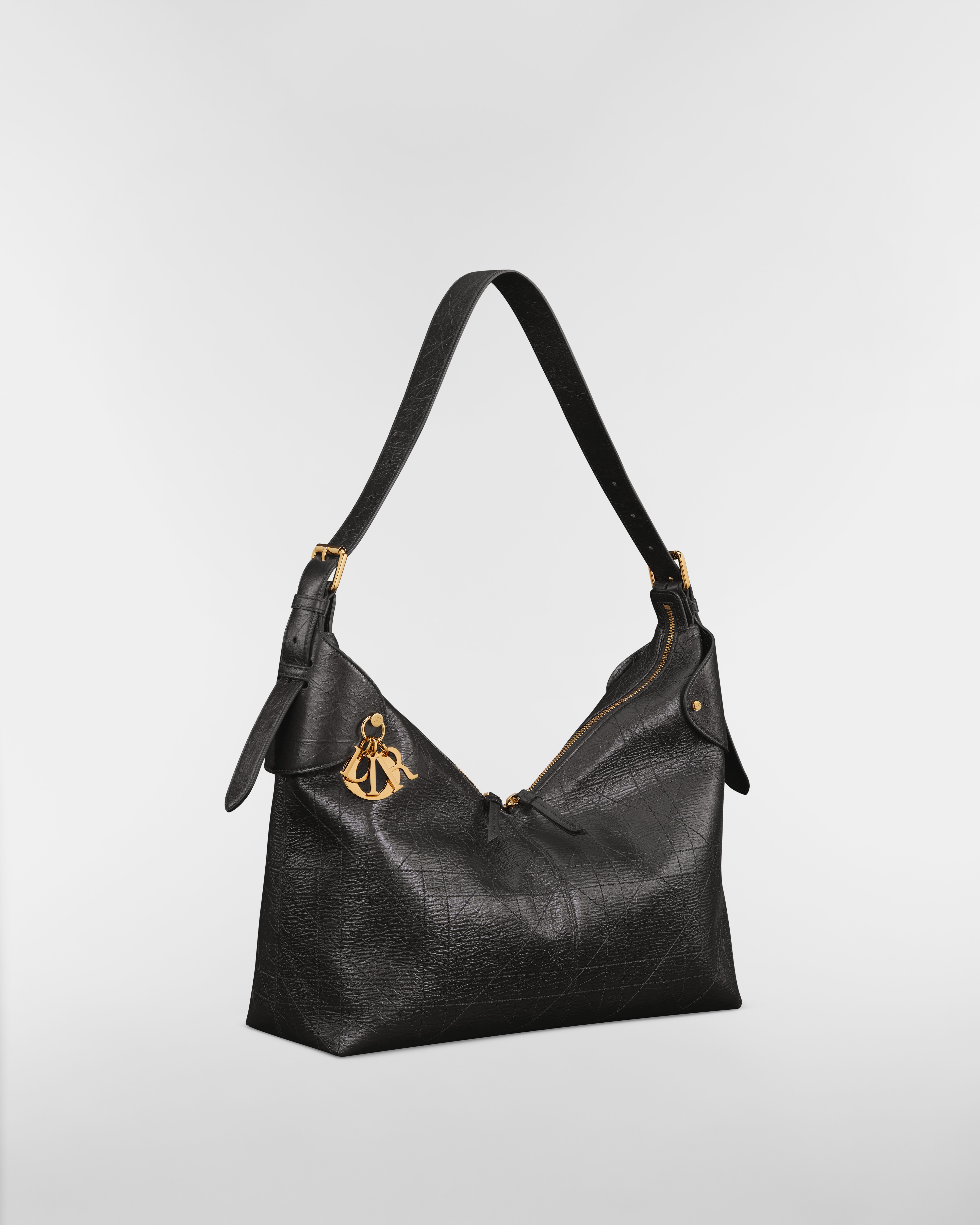 Große Dior Voyage Tasche Flat Macrocannage Kalbsleder in Knitteroptik in Schwarz E03