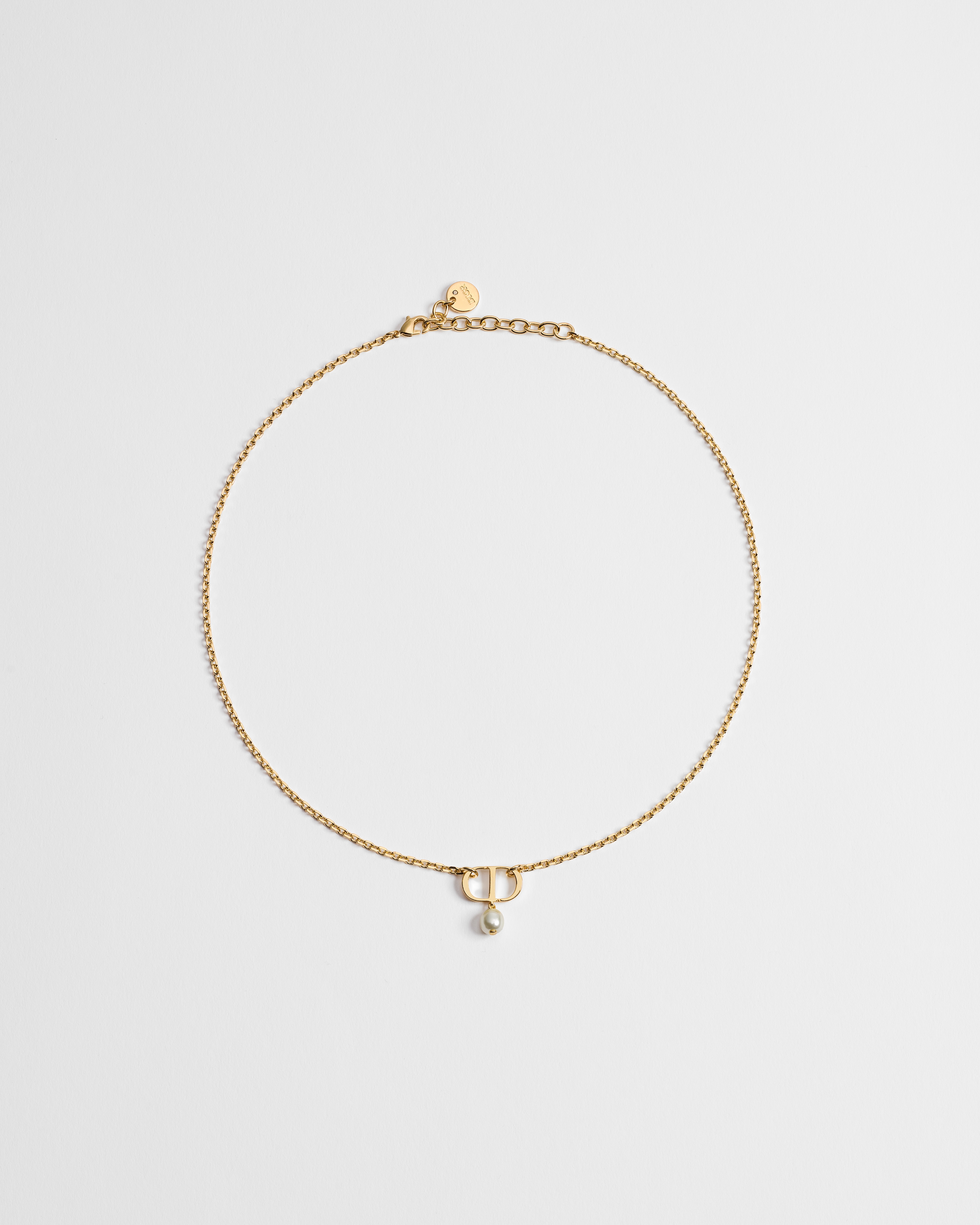 Petit CD-ketting Metaal met goudkleurige afwerking en witte harsparel E01