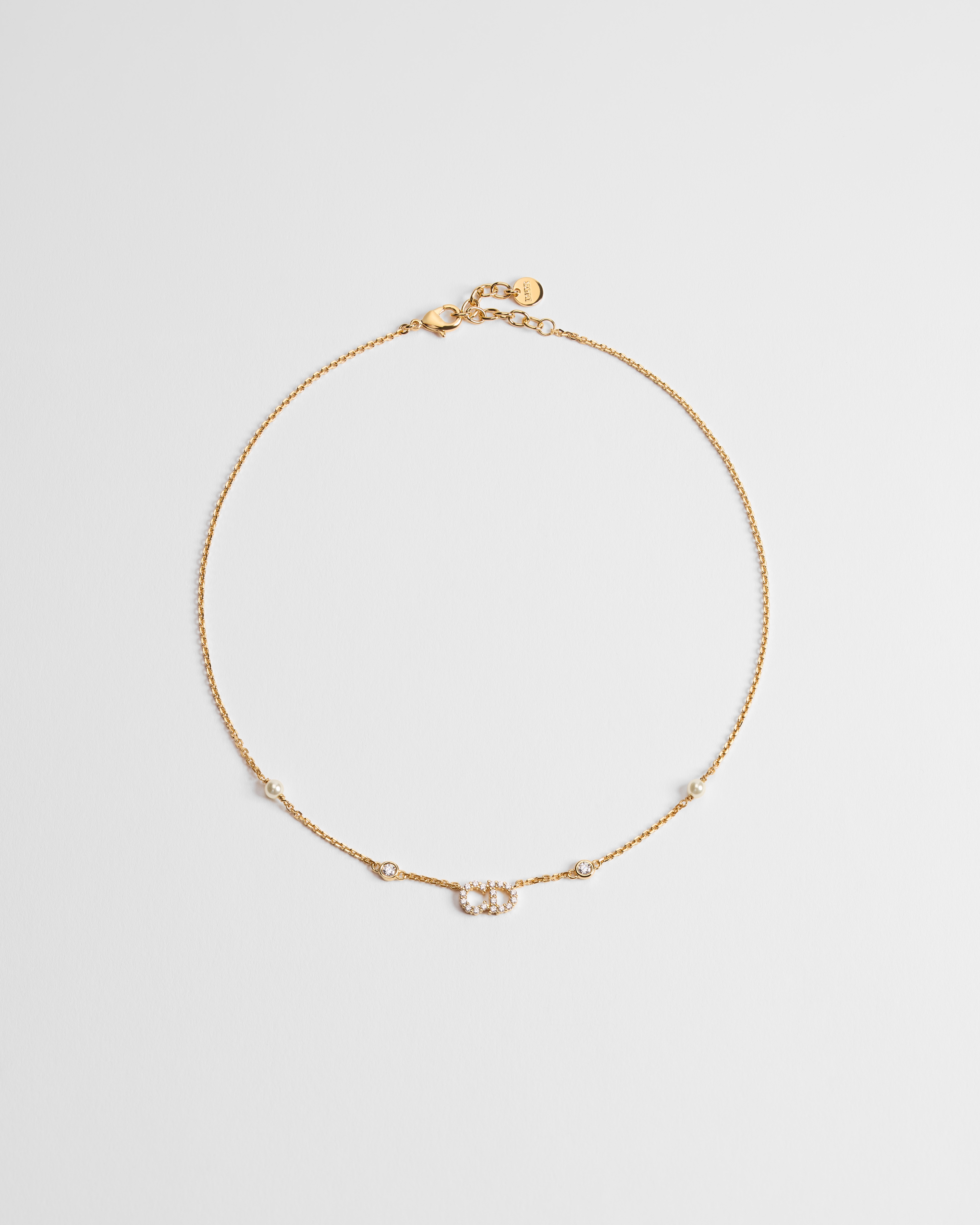 Clair D Lune-ketting Metaal met goudkleurige afwerking, witte harsparels en fonkelende kristallen E01