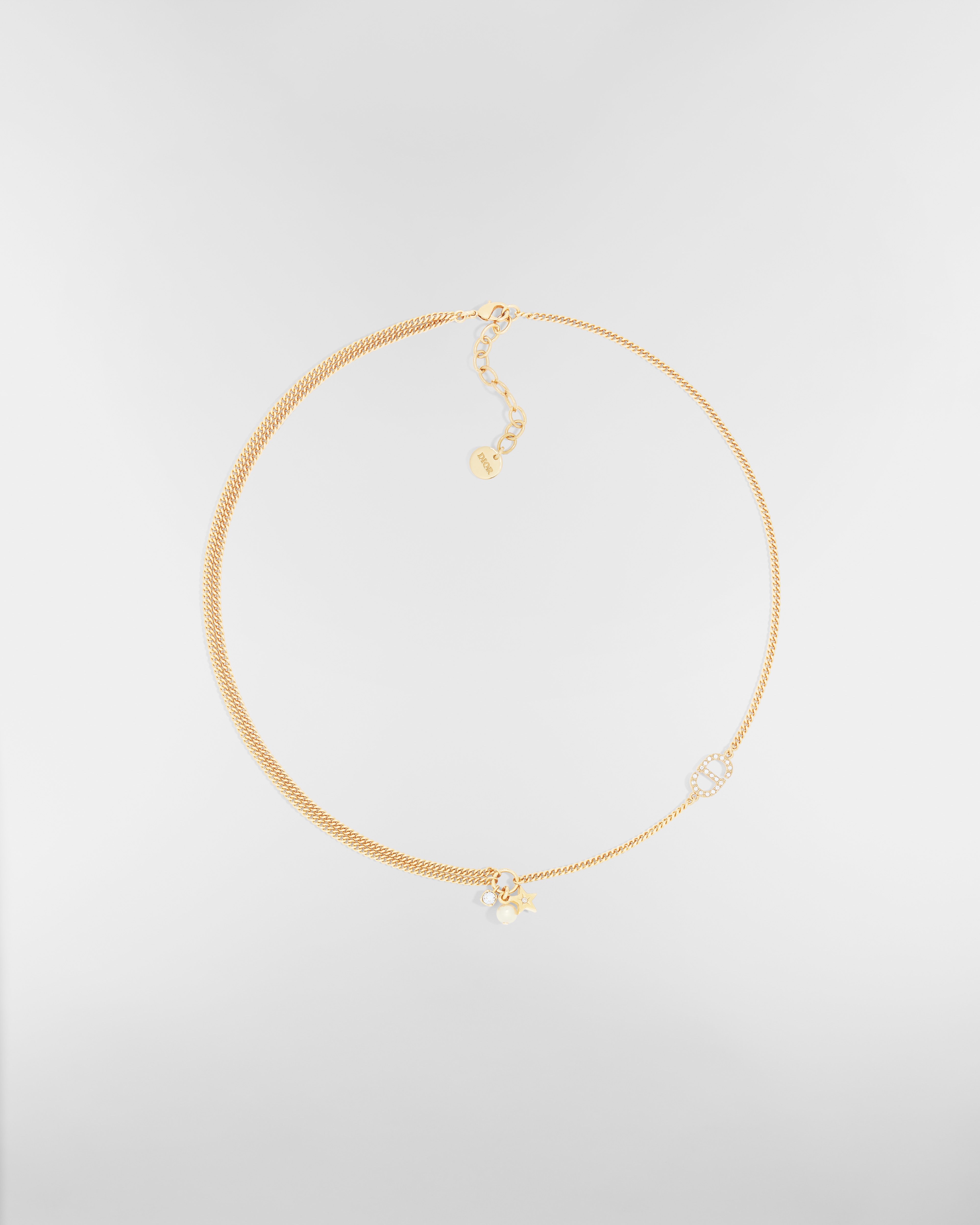 Petit CD Multi-ketting Metaal met goudkleurige afwerking, witte harsparel en zilverkleurige kristallen E01