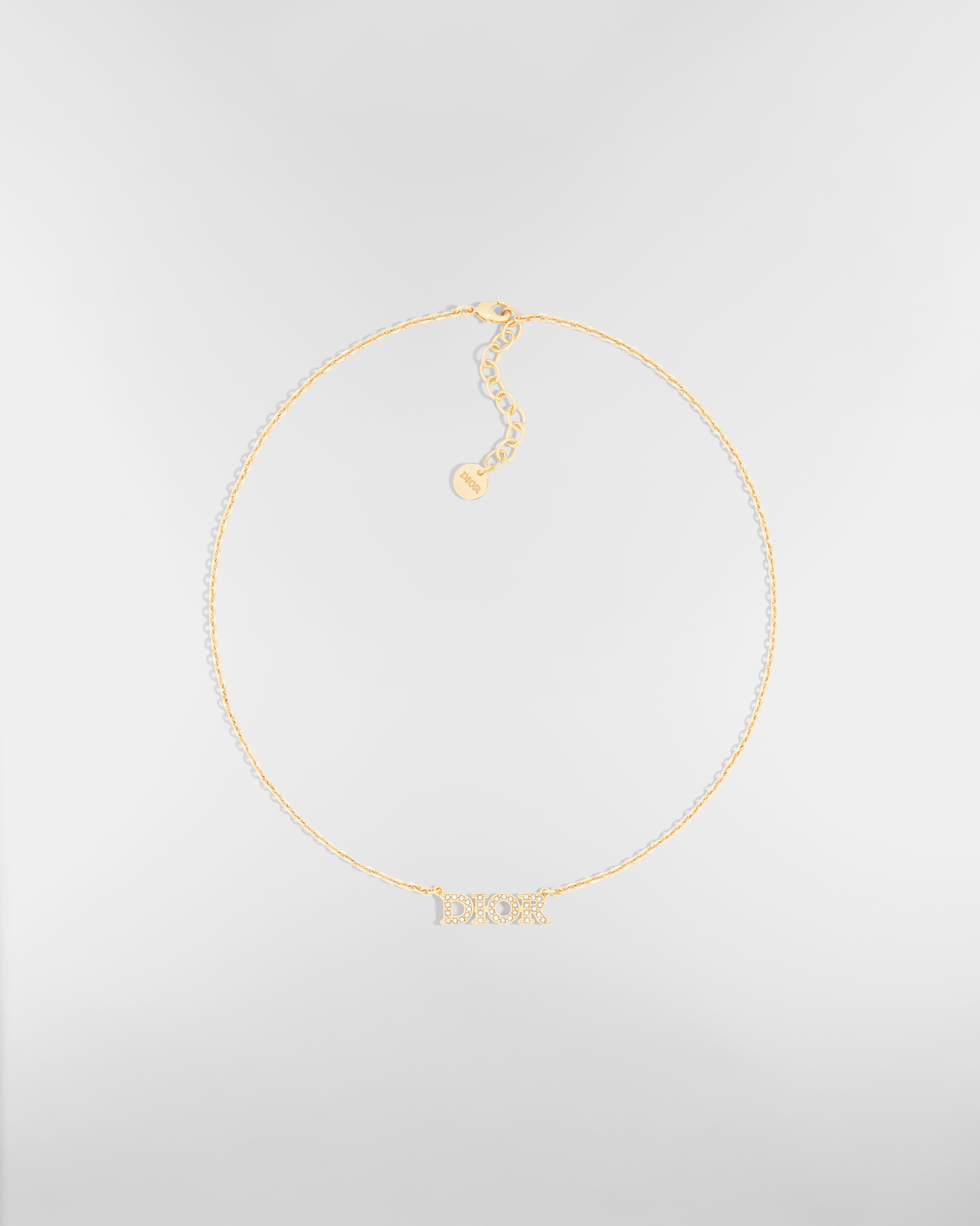 Dio(r)evolution-ketting Metaal met goudkleurige afwerking en zilverkleurige kristallen E01