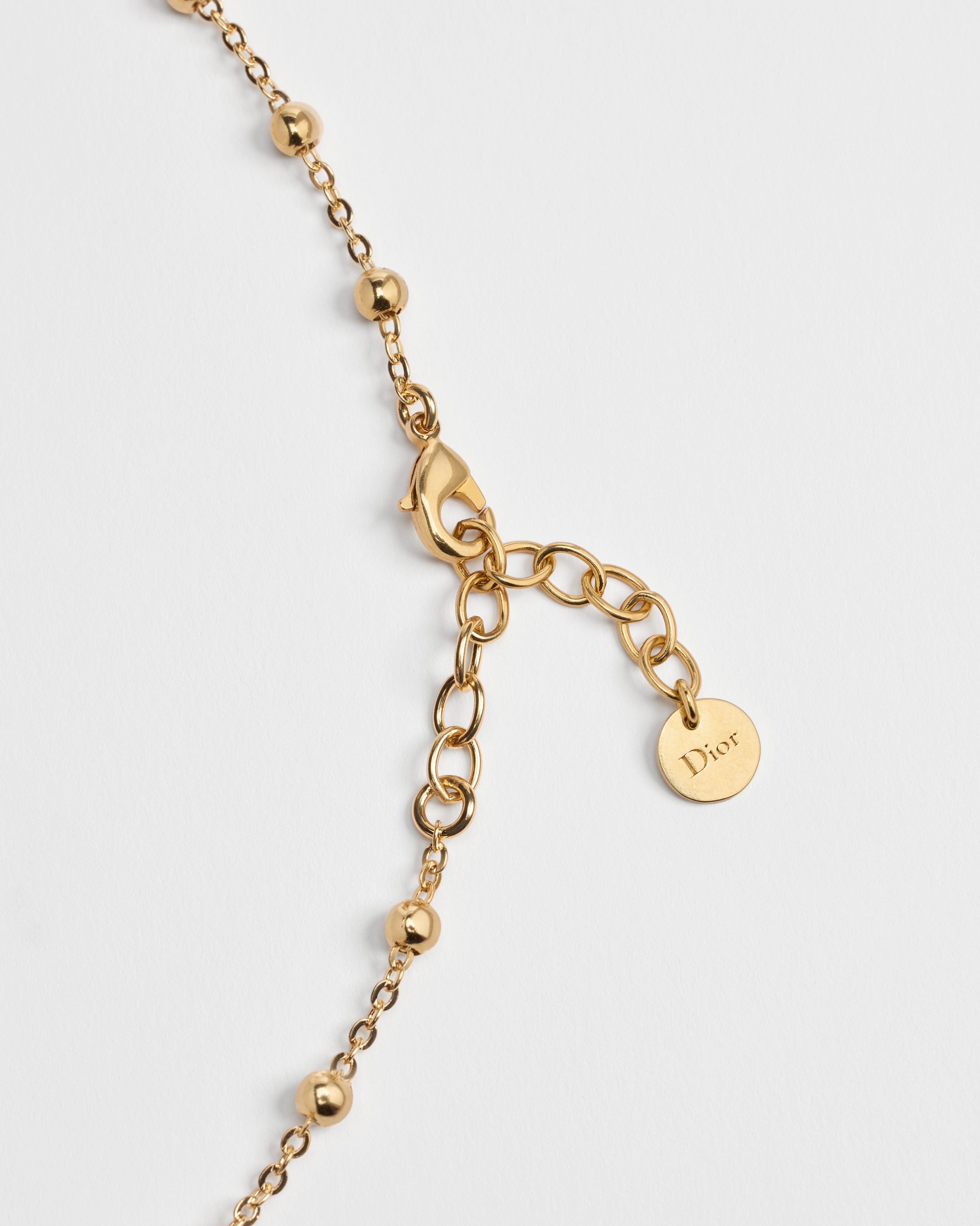 Collier Lucky Dior Métal finition dorée et cristaux blancs E10