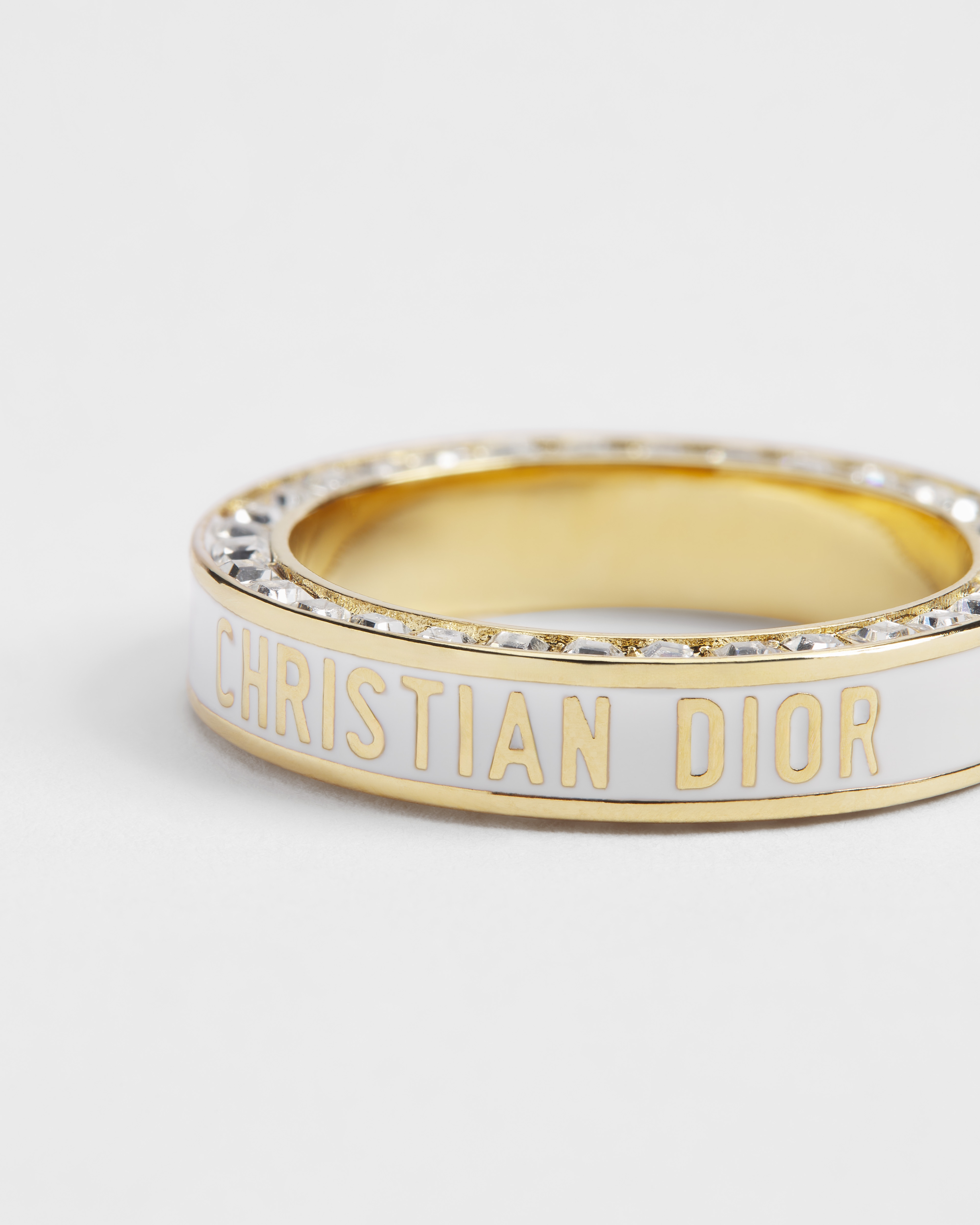 خاتم Dior Night Code معدن ذهبي وحبّات كريستال وطلاء البرنيق الأبيض E09