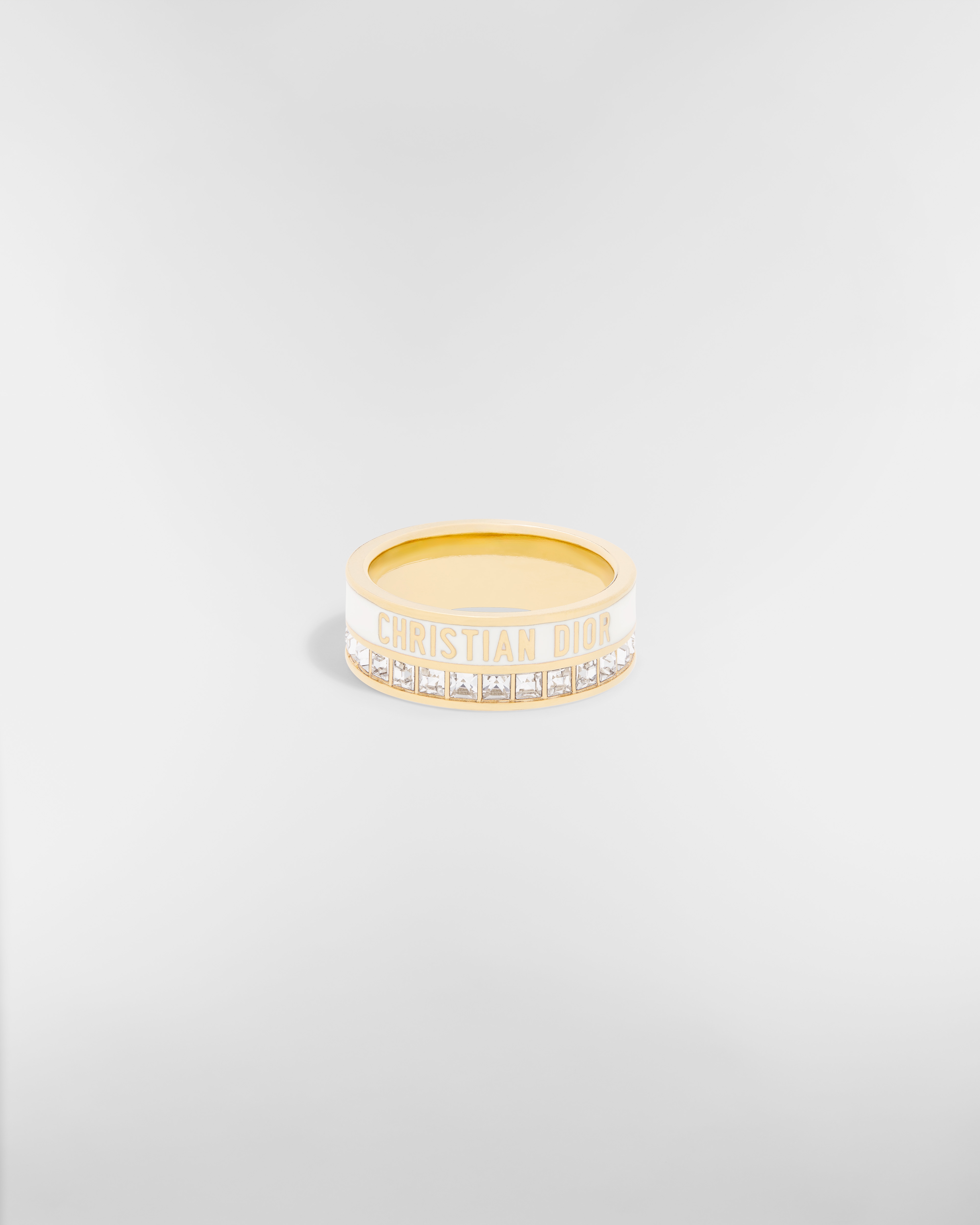 Anel Dior Night Code Metal com acabamento dourado, cristais brilhantes e laca branca E01