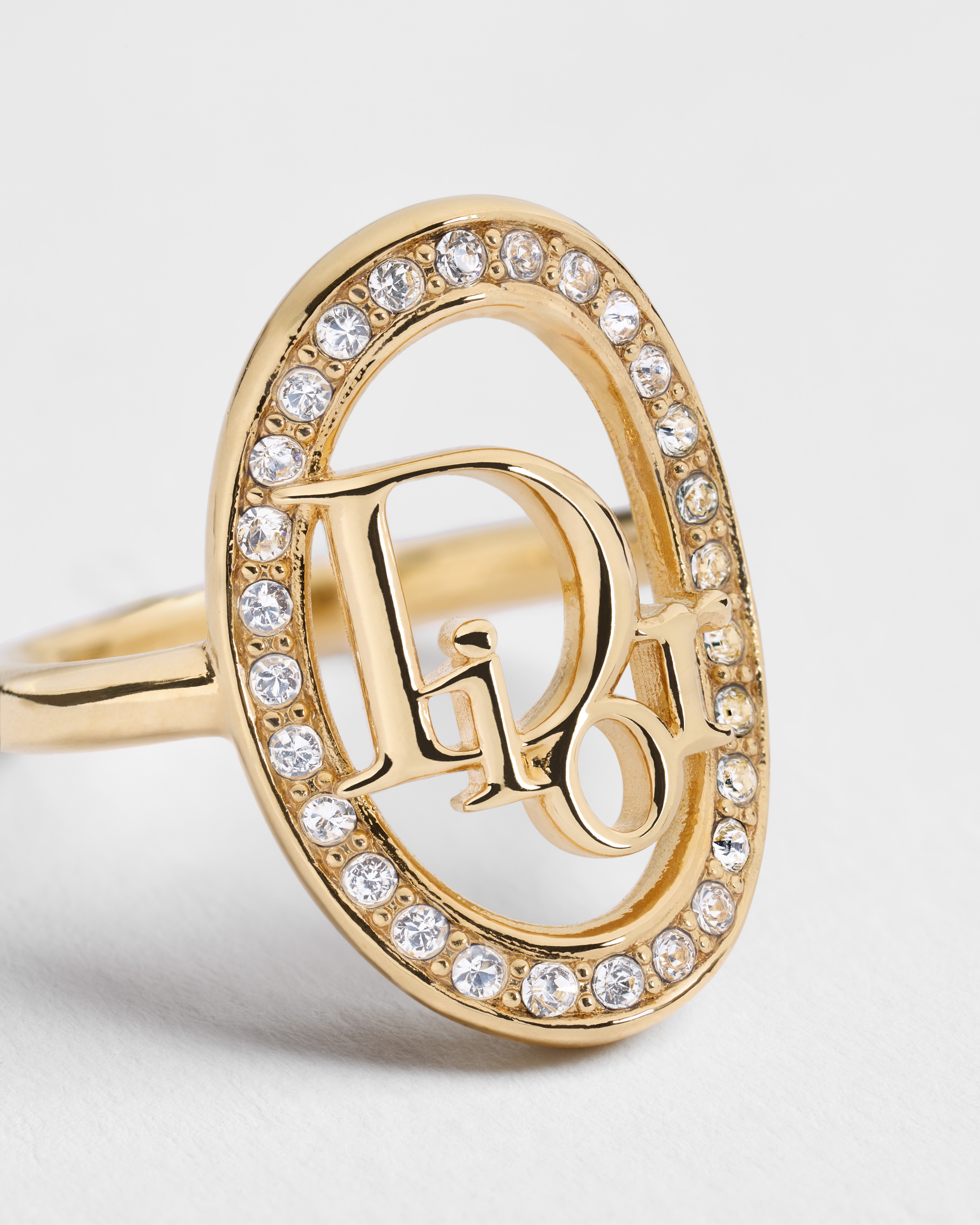 Anillo Dior Oblique Metal dorado y cristales E09