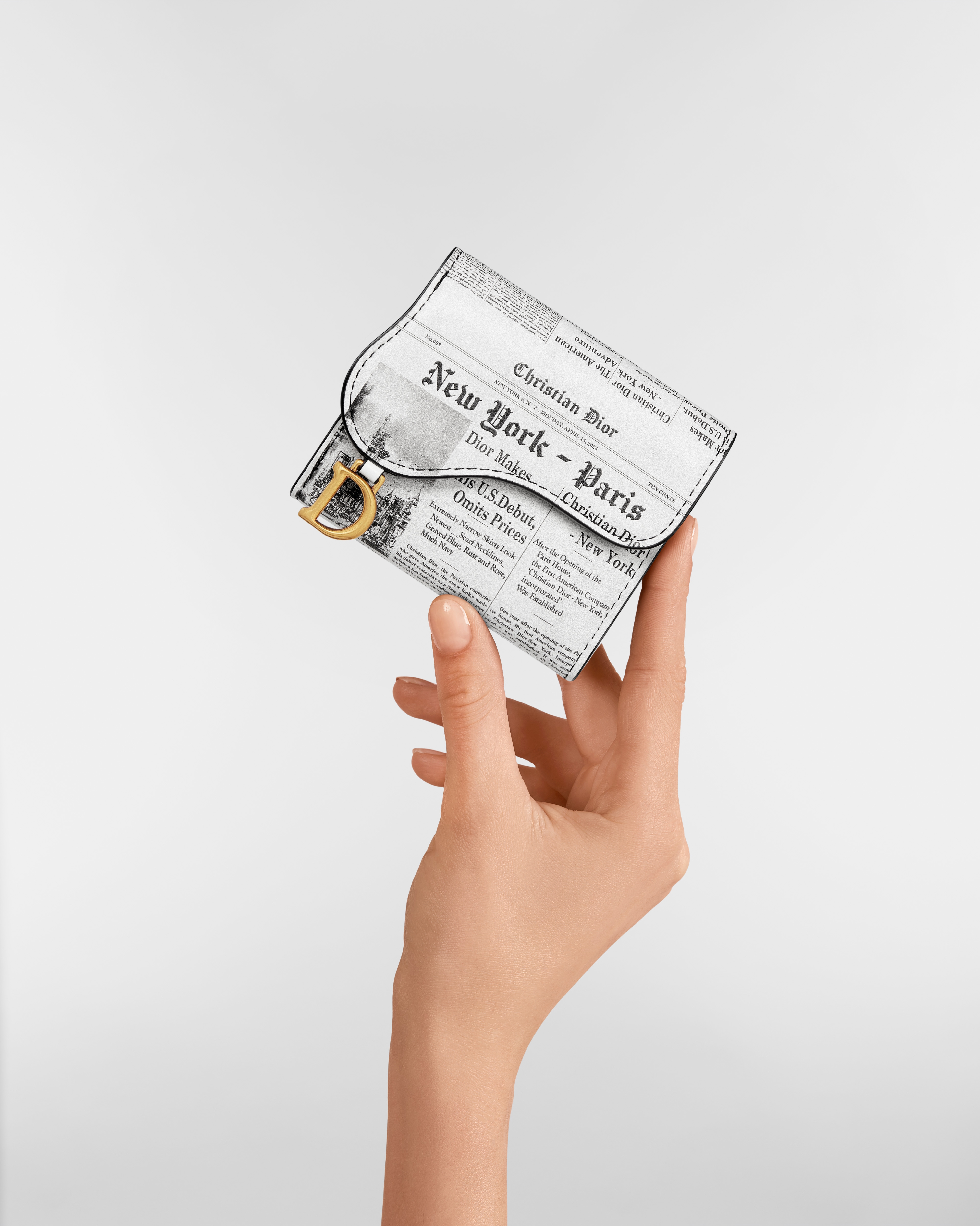 Saddle Lotus Portemonnaie Kalbsleder mit Newspaper Print in Weiß und Schwarz E11