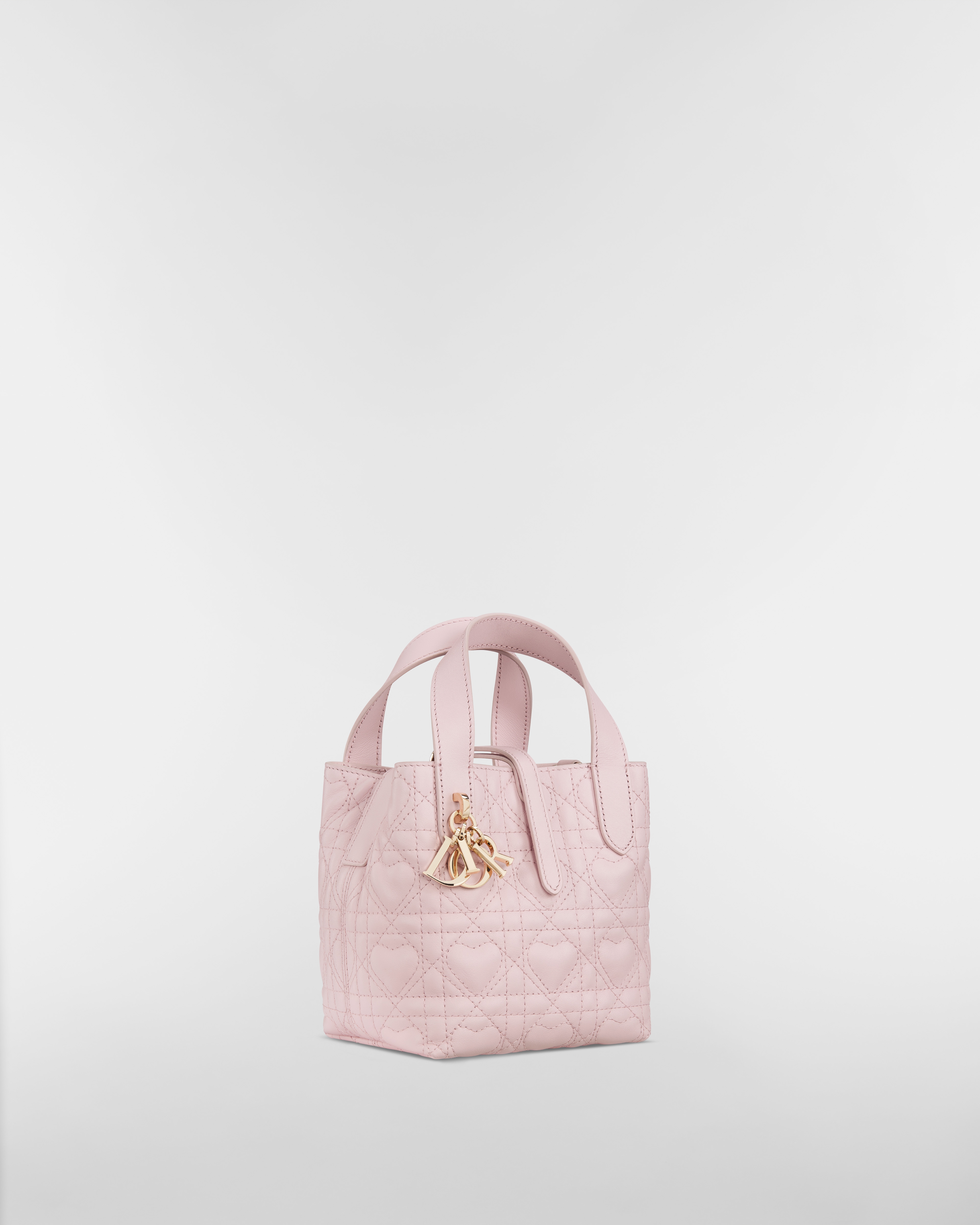 Nanobolso tote vertical Dior Toujours Piel de becerro Cannage con motivo de corazón rosa macarrón E03